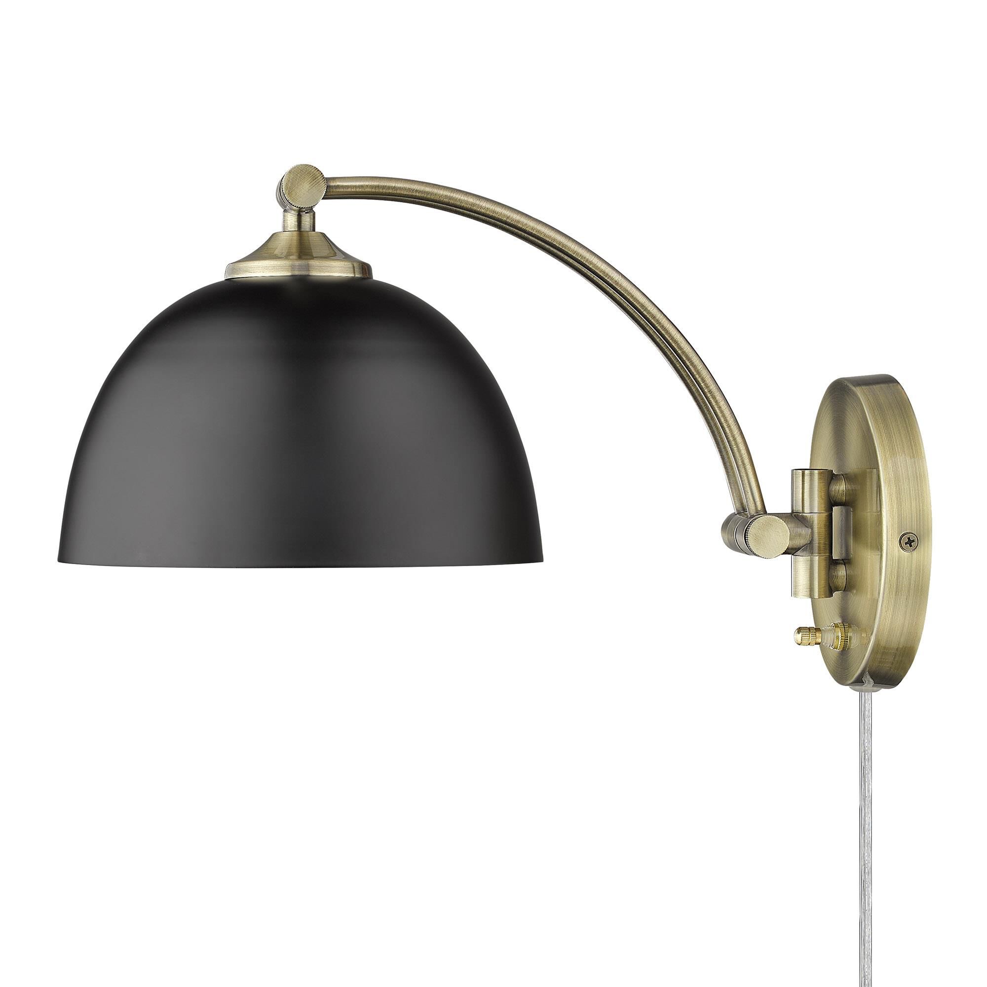 Shown in Aged Brass finish and Matte Black shade