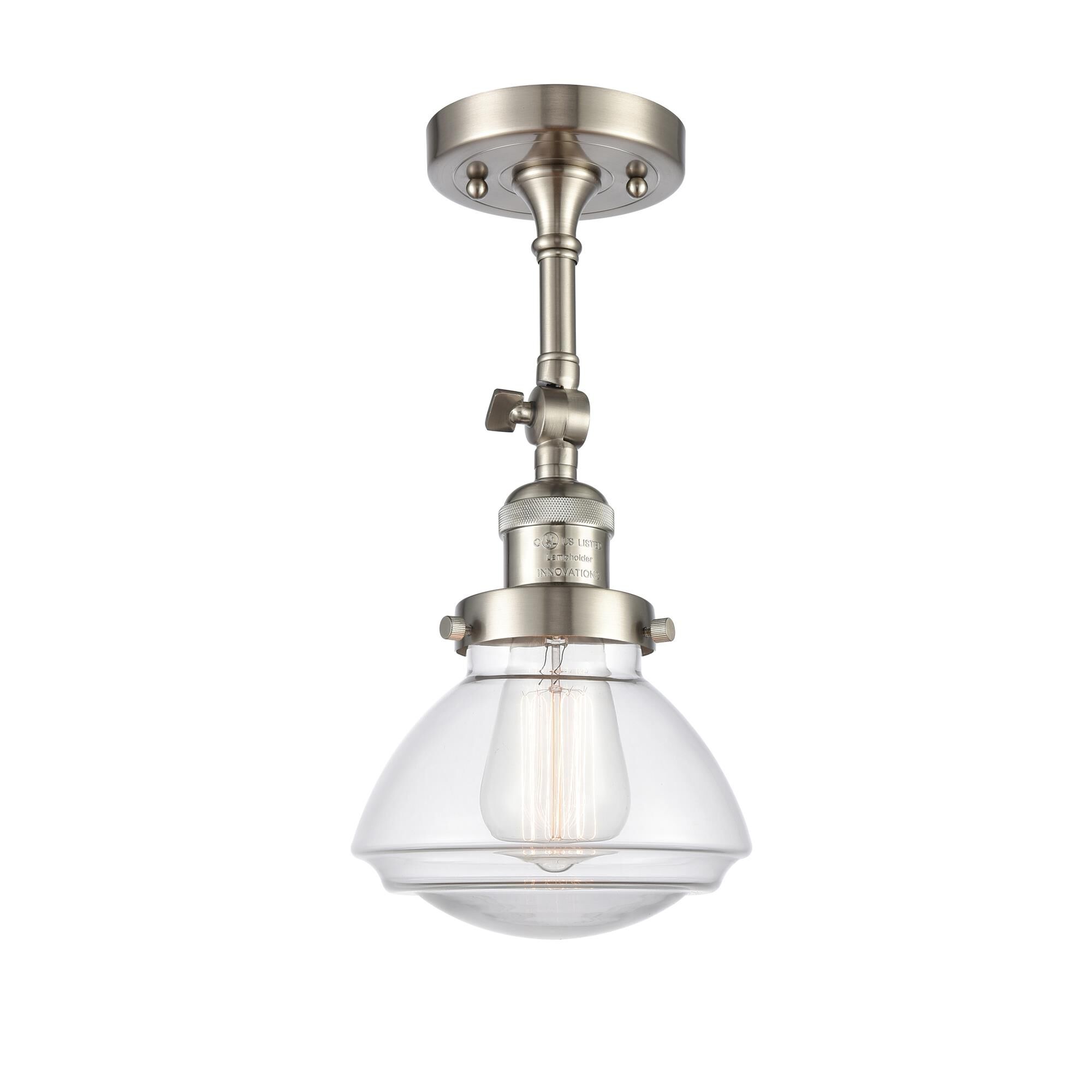 Shown in Brushed Satin Nickel finish and Transparent  Clear Olean glass and Glass shade and Bulb Tint - Amber accent