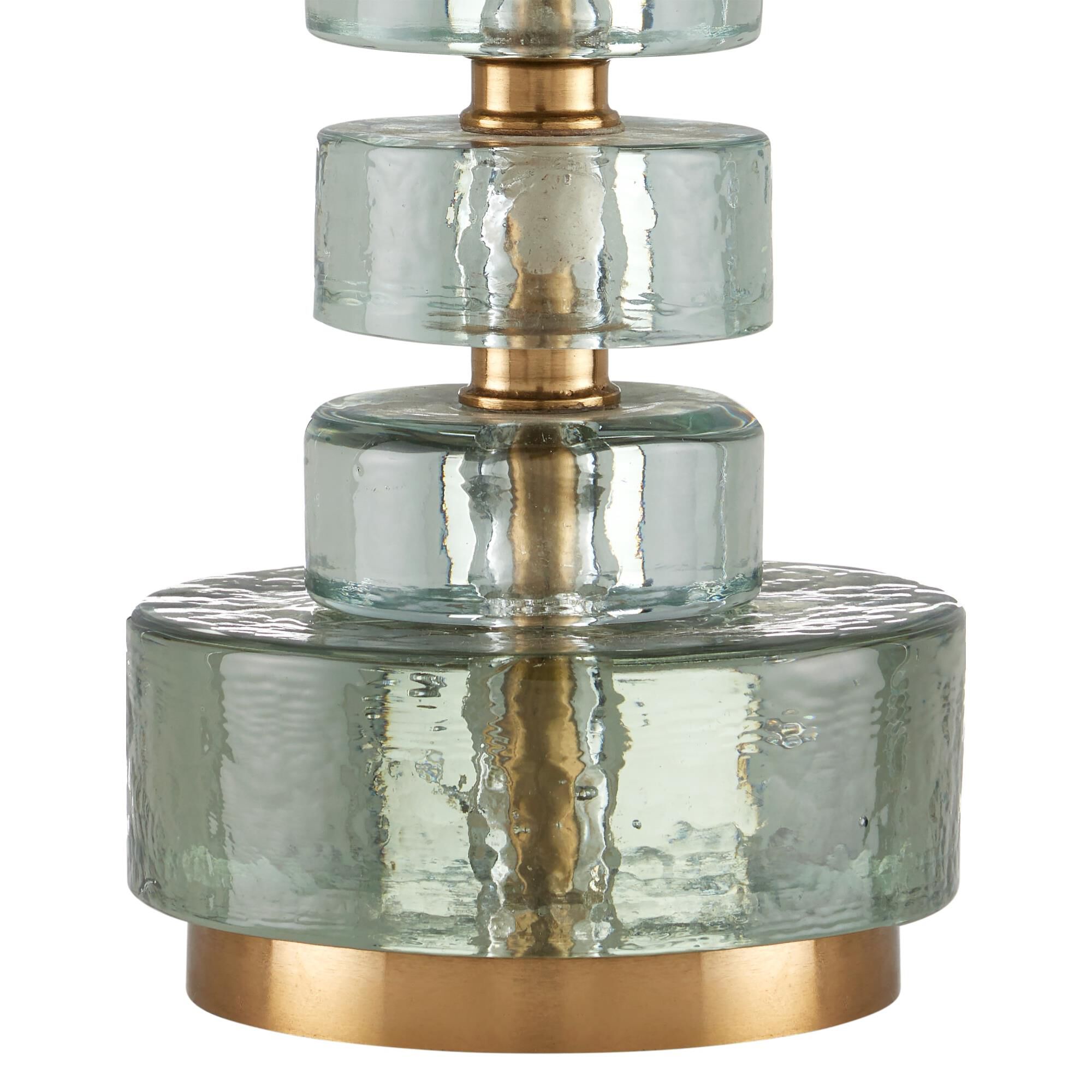 Shown in Clear, Antique Brass finish and Off-White Linen shade