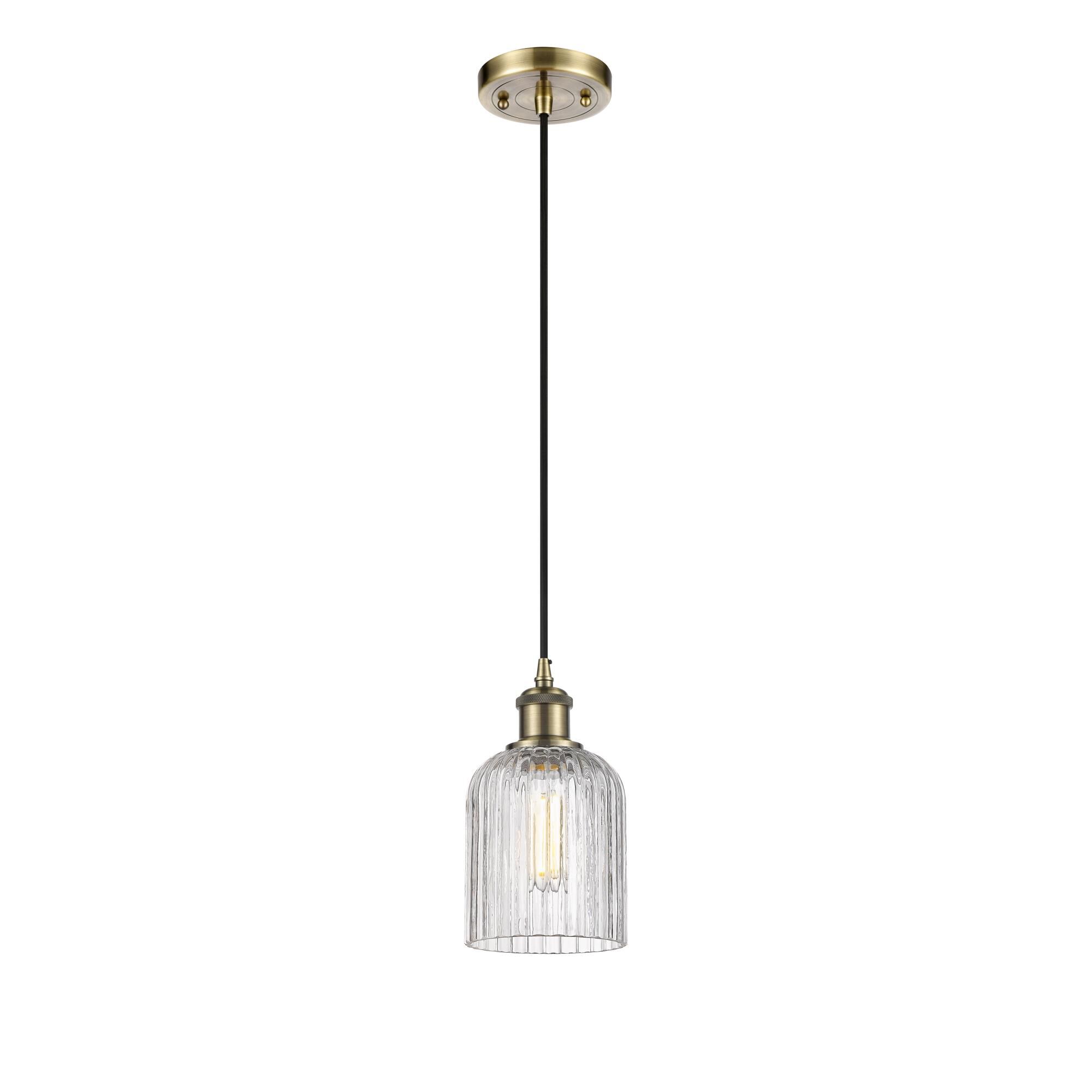 Shown in Antique Brass finish and Clear glass