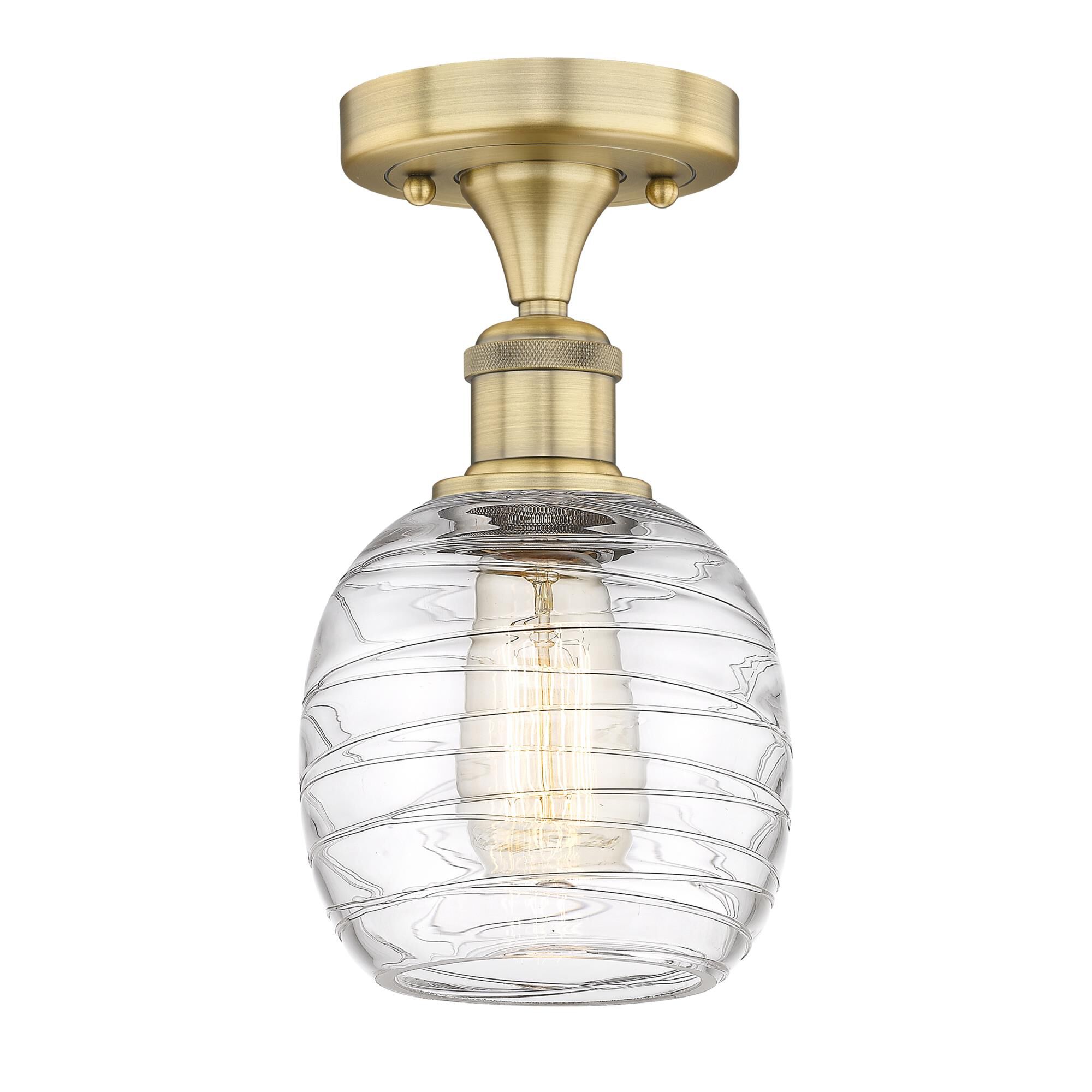 Shown in Brushed Brass finish and Deco Swirl glass