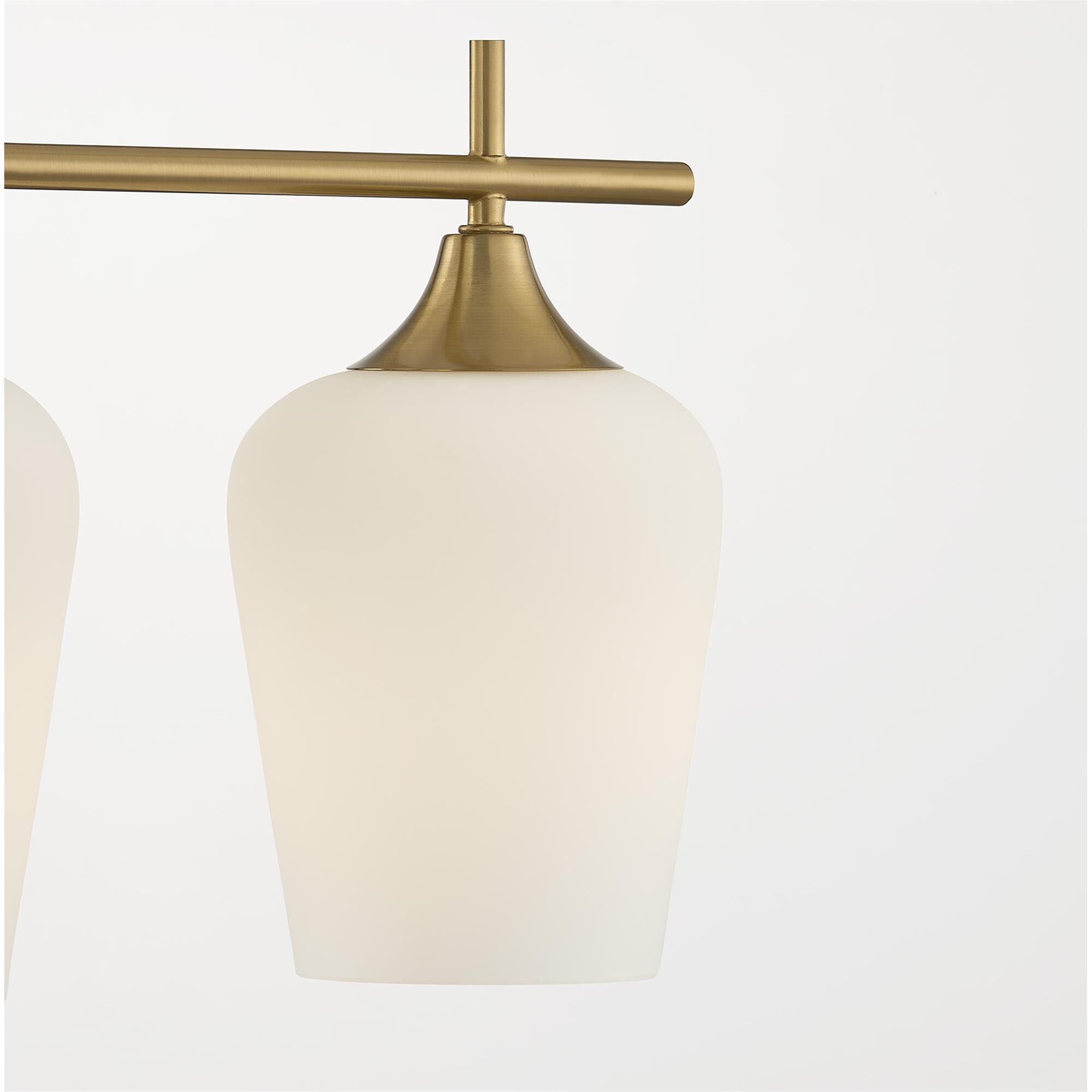 Shown in Warm Brass finish and White Opal glass
