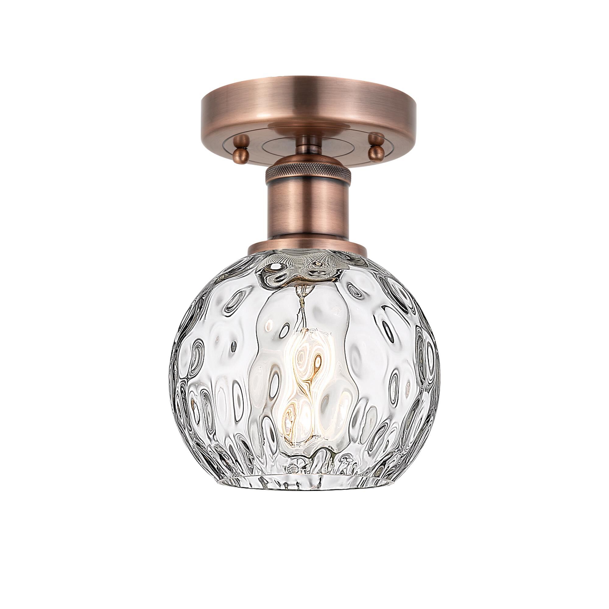 Shown in Antique Copper finish and Clear Water Glass glass