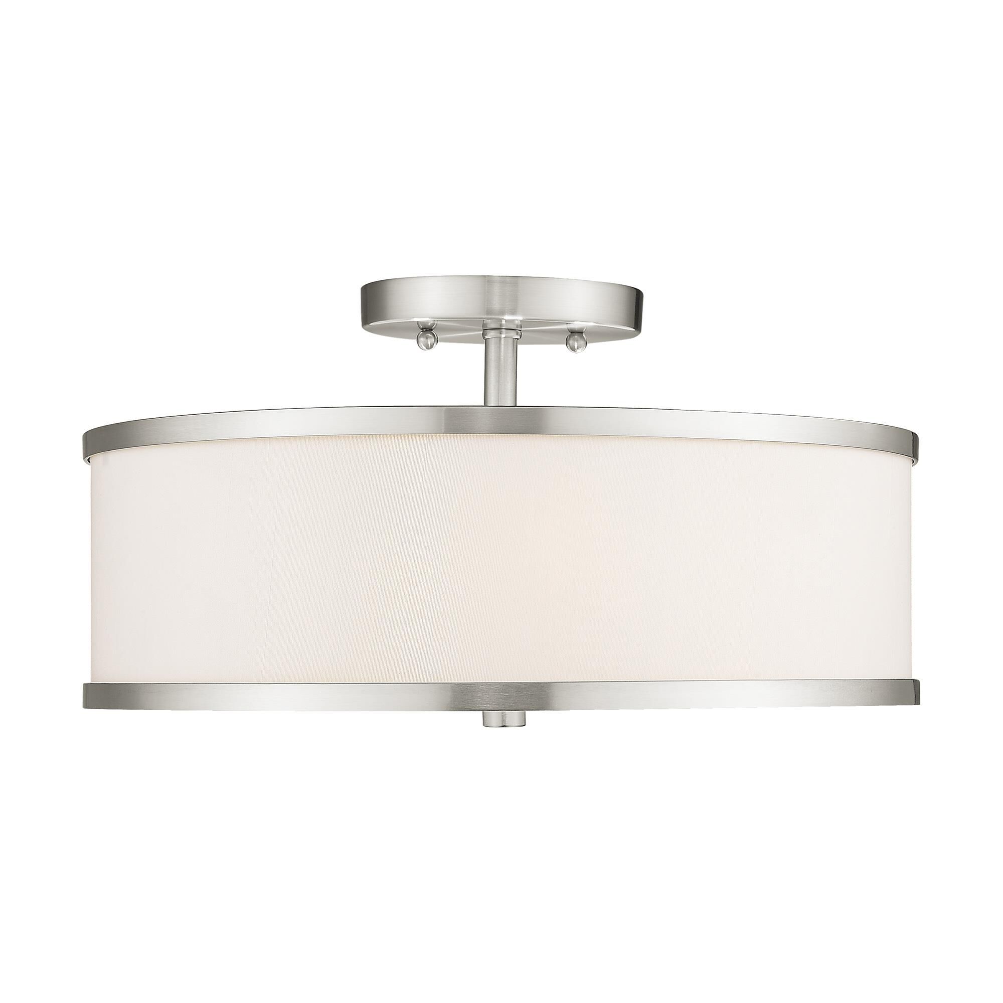 Shown in Brushed Nickel finish and Hand Crafted Off-White Fabric Hardback shade