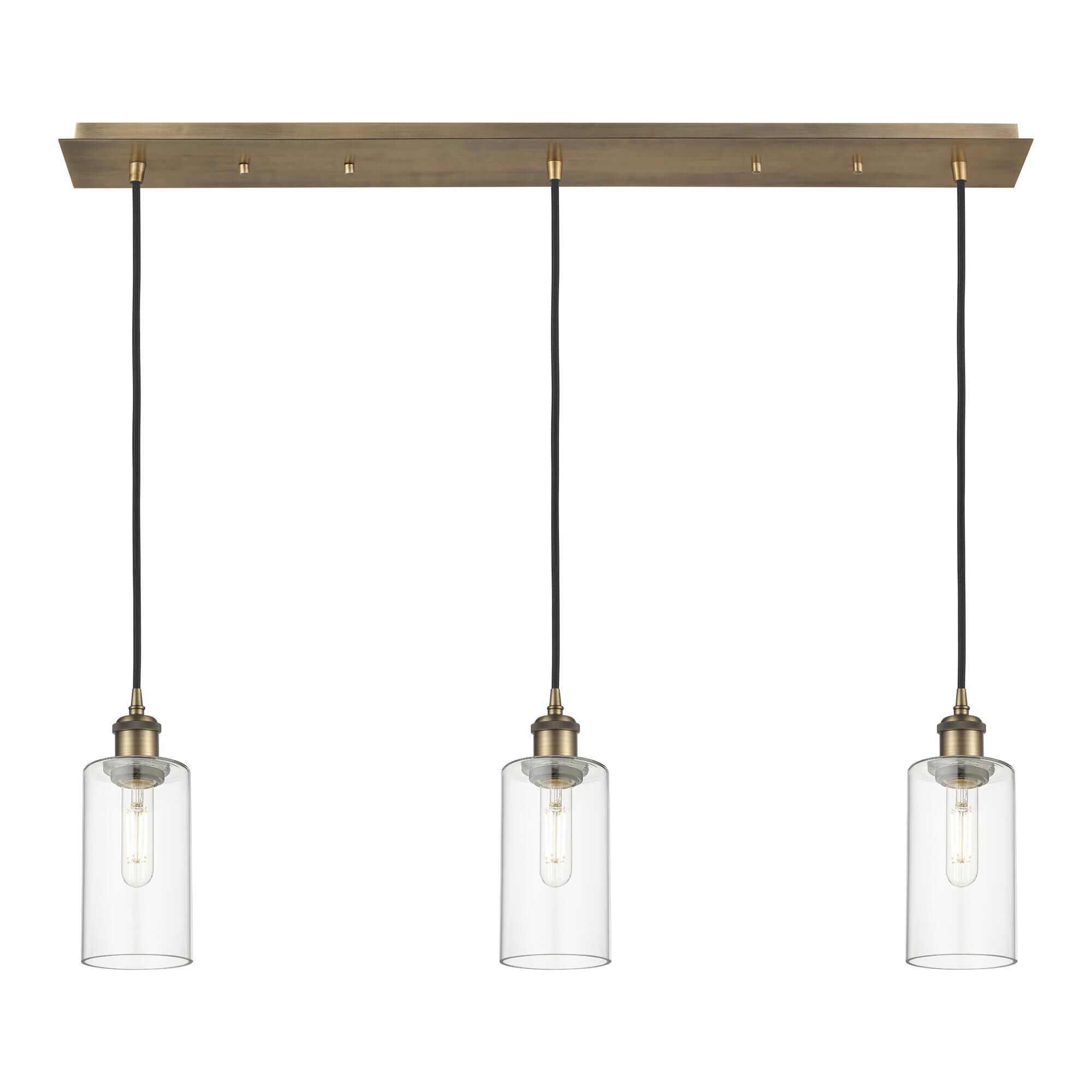 Shown in Brushed Brass finish and Clear shade