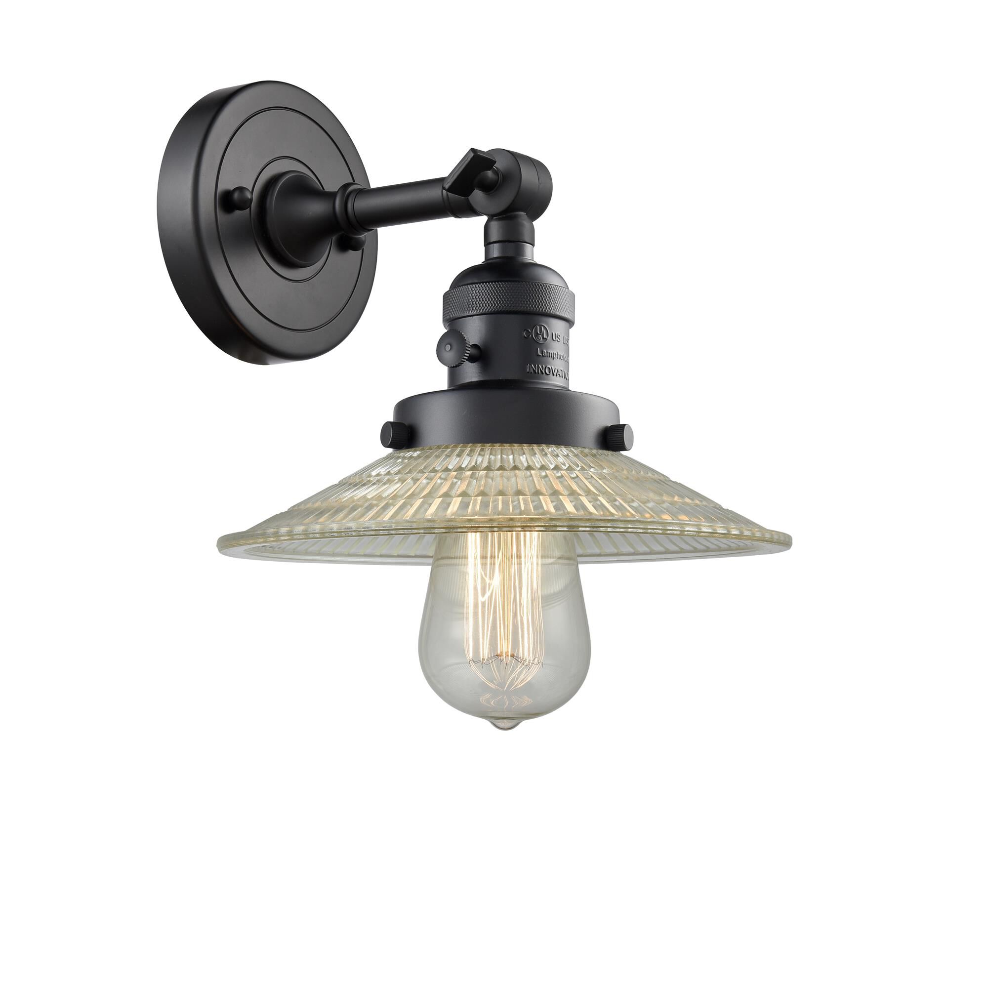 Shown in Matte Black finish and Clear Halophane glass and Switch on Socket accent