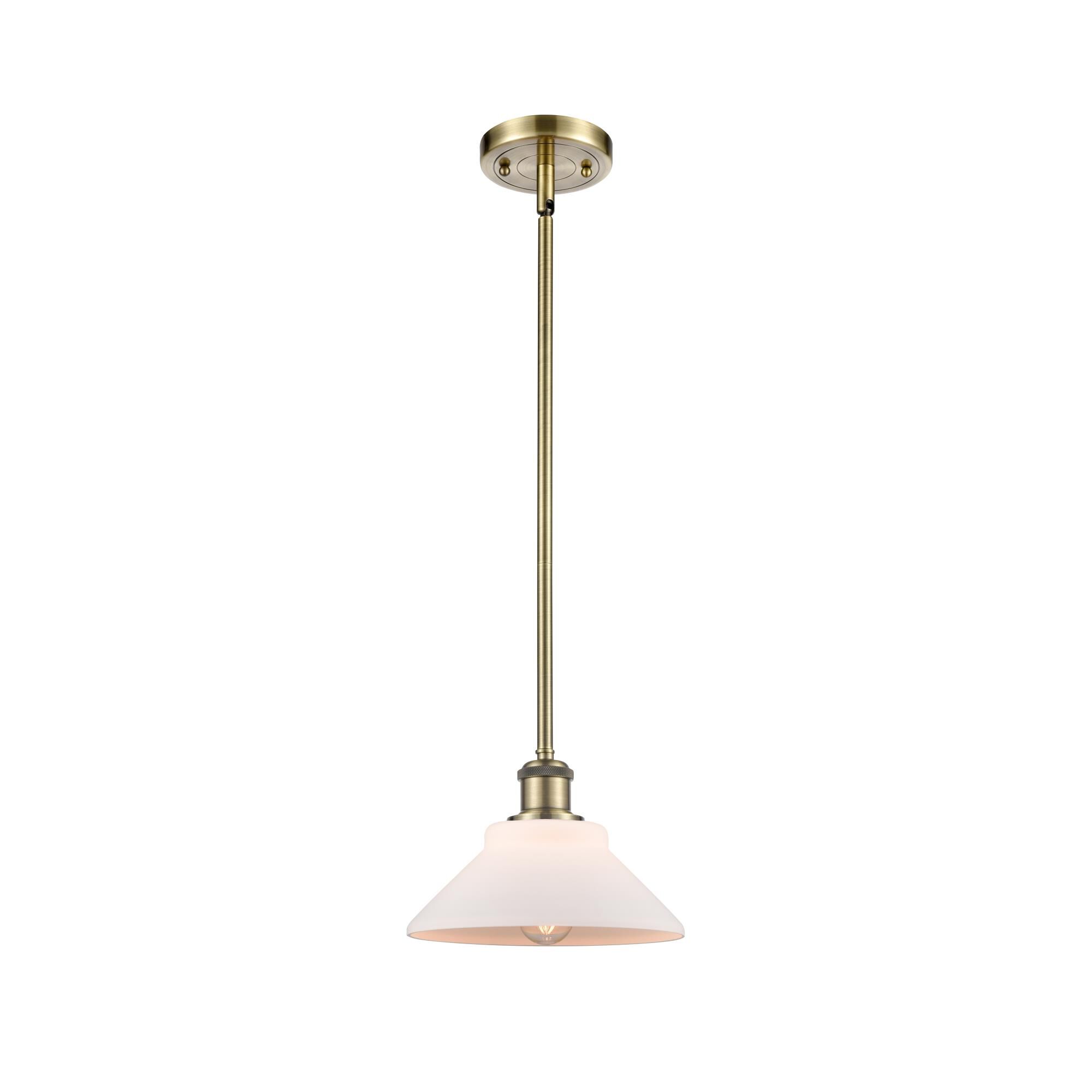 Shown in Antique Brass finish and Matte White Orwell glass