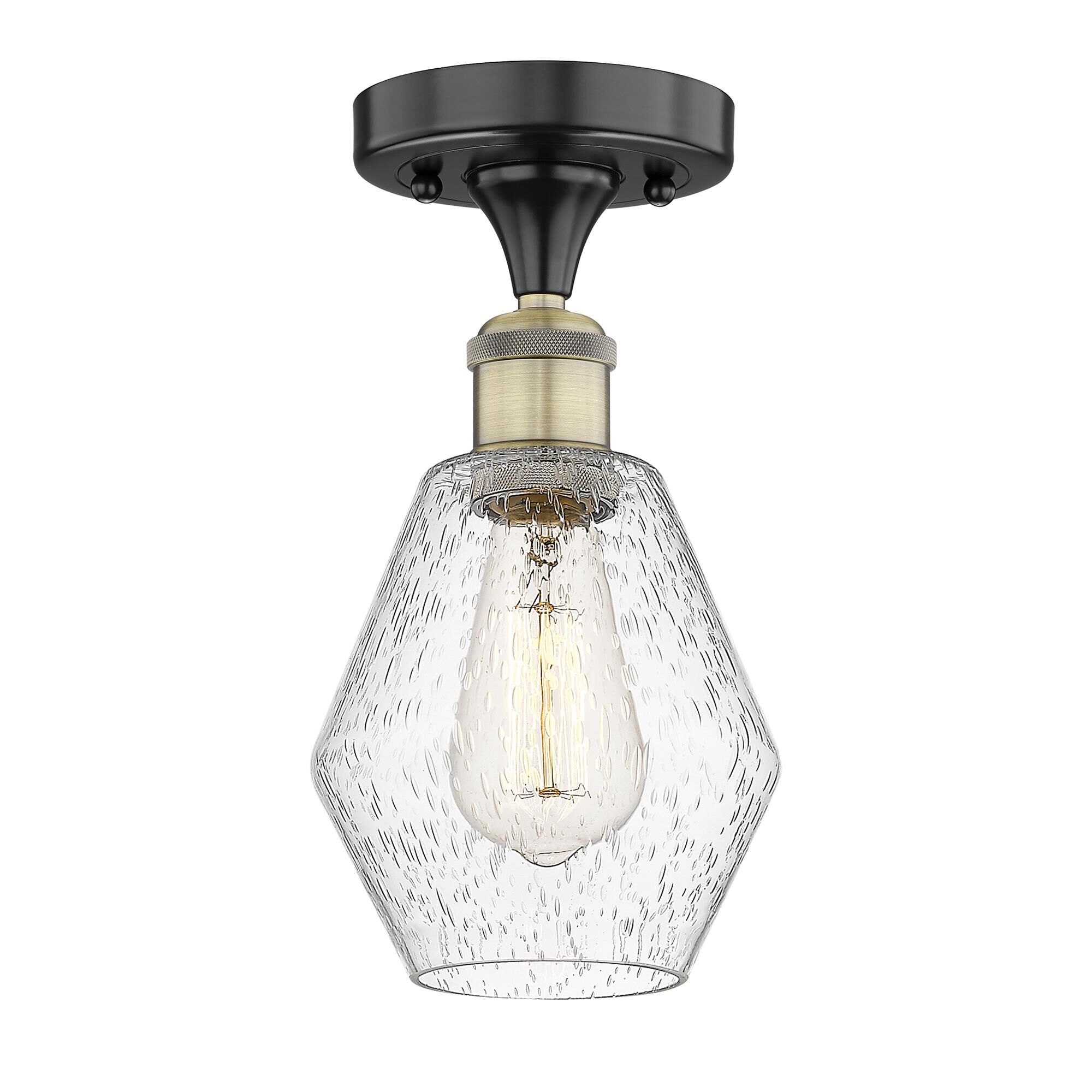 Shown in Black Antique Brass finish and Seedy glass