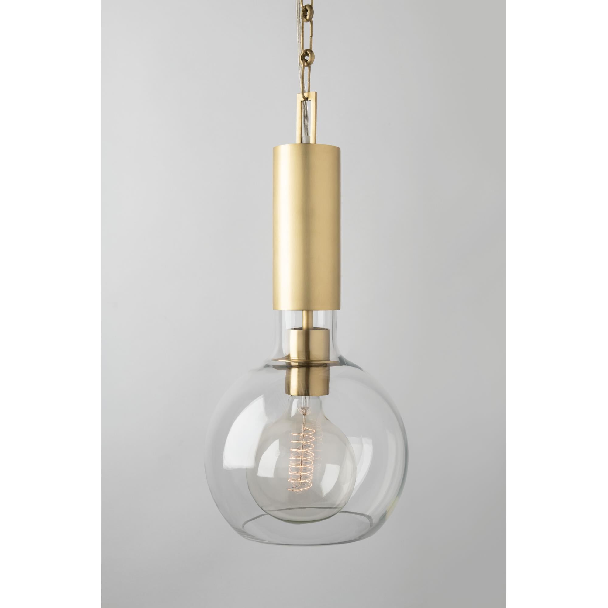 Shown in Aged Brass finish and Clear glass