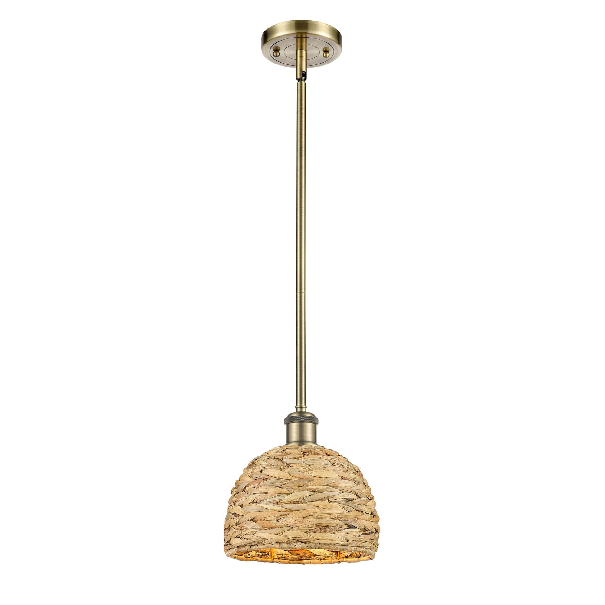 Shown in Antique Brass finish and Natural shade