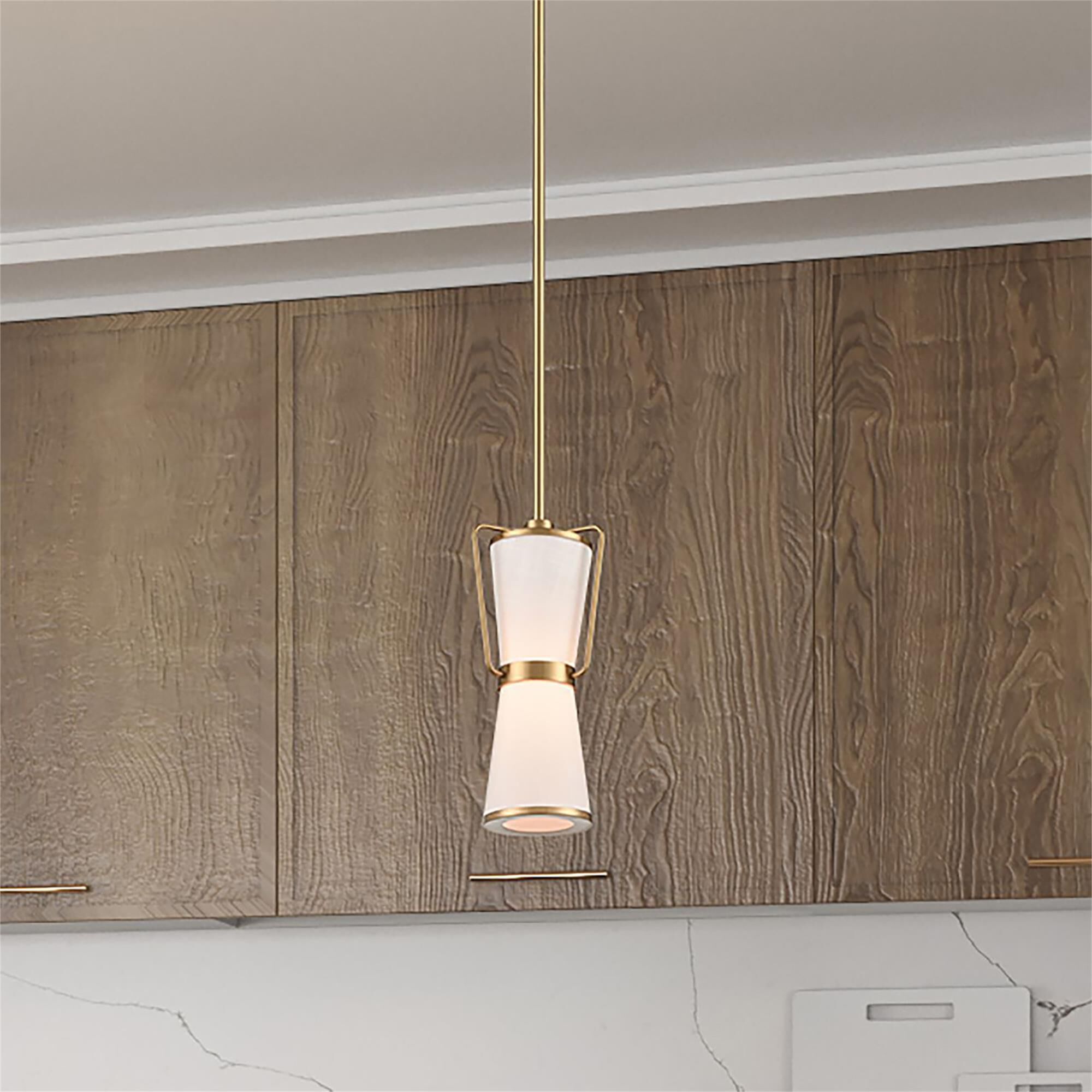 Shown in Brushed Brass finish and Etched glass and White Linen shade