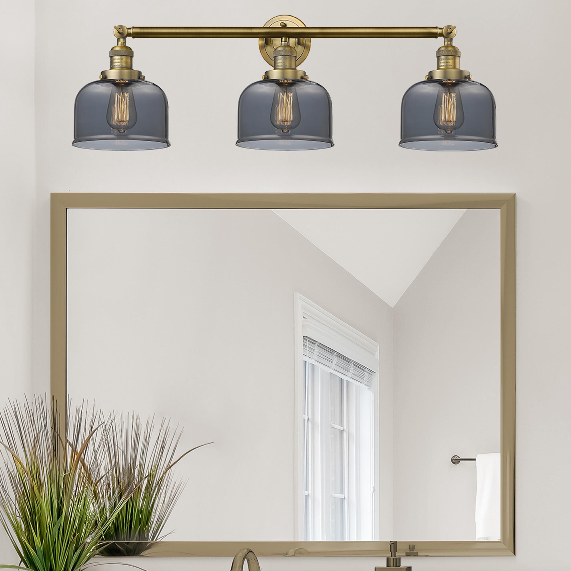 Shown in Brushed Brass finish and Plated Smoked glass