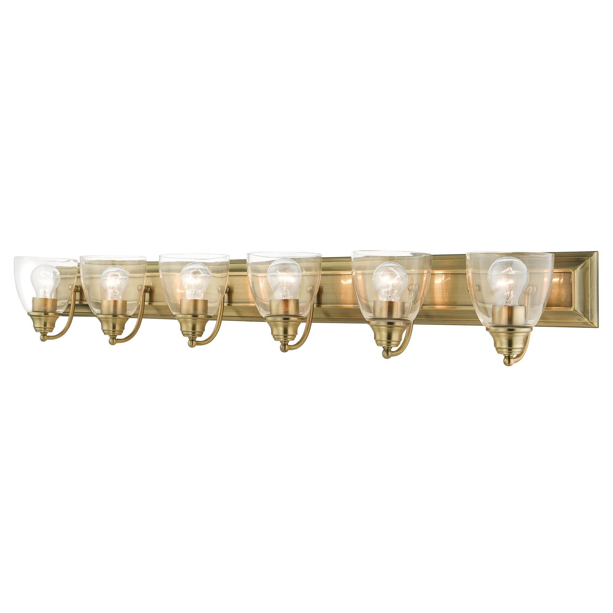 Shown in Antique Brass finish and Hand Blown Clear glass