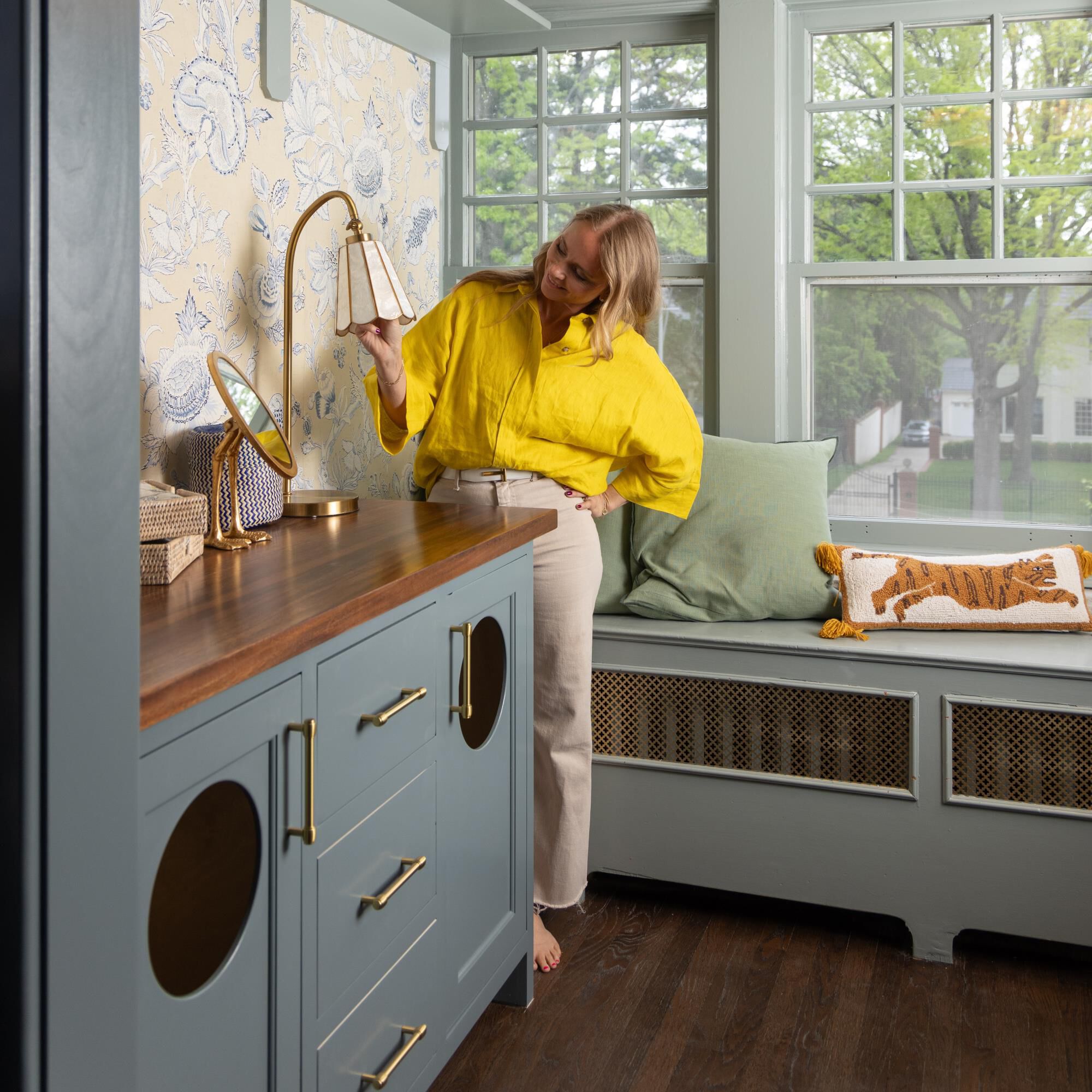 Shown in Polished Brass finish and Capiz shade