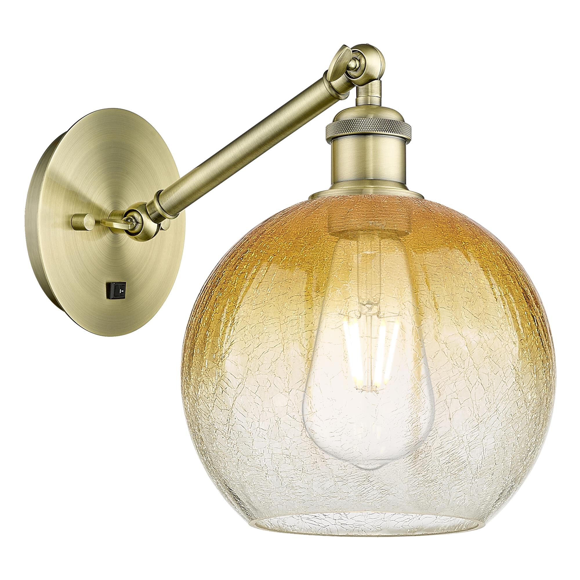 Shown in Antique Brass finish and Amber glass