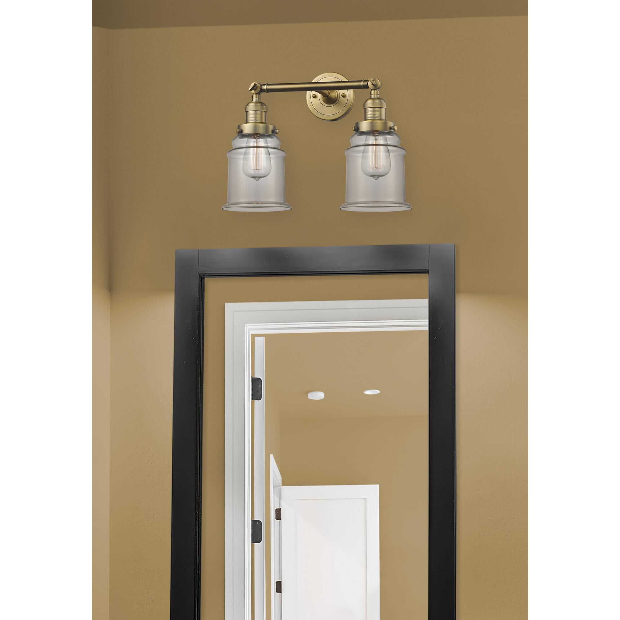 Shown in Brushed Brass finish and Clear glass