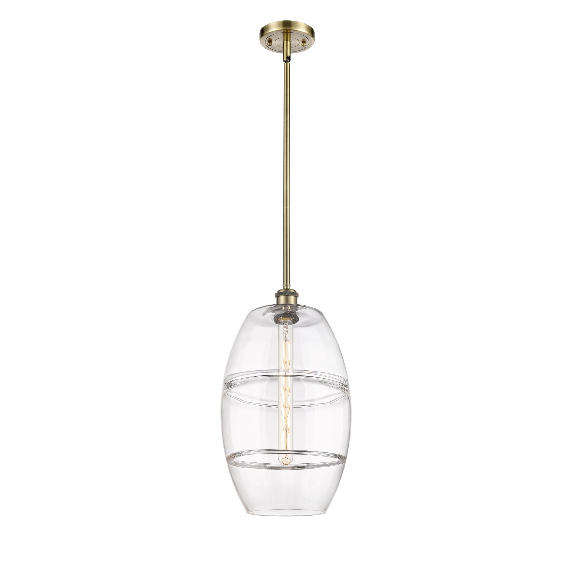 Shown in Antique Brass finish and Clear glass