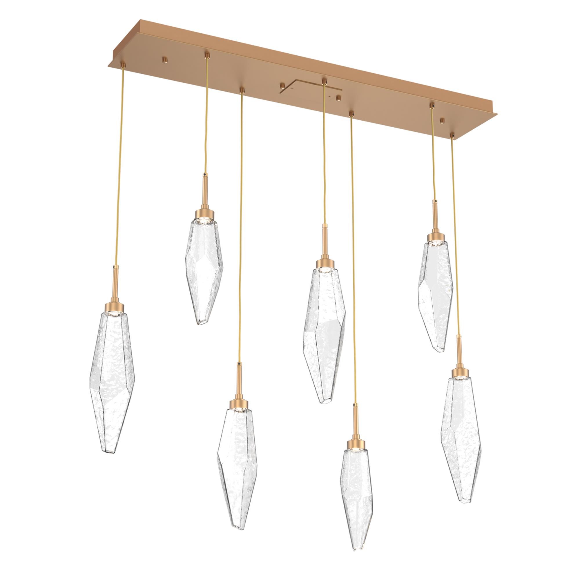 Shown in Novel Brass finish and Chilled Blown And Clear glass