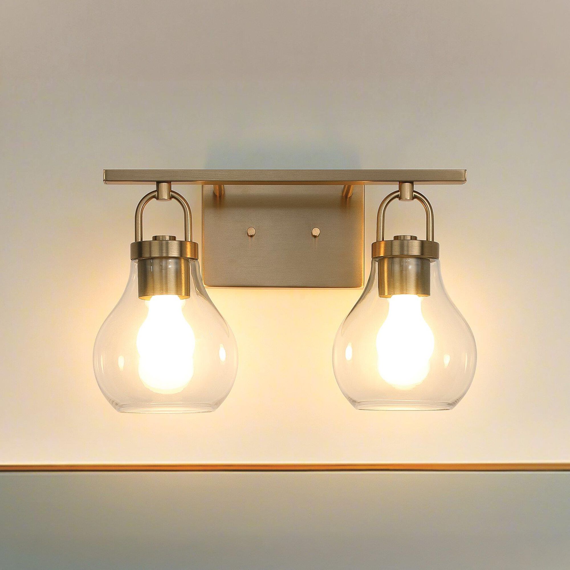 Shown in Champagne Gold finish and Clear glass
