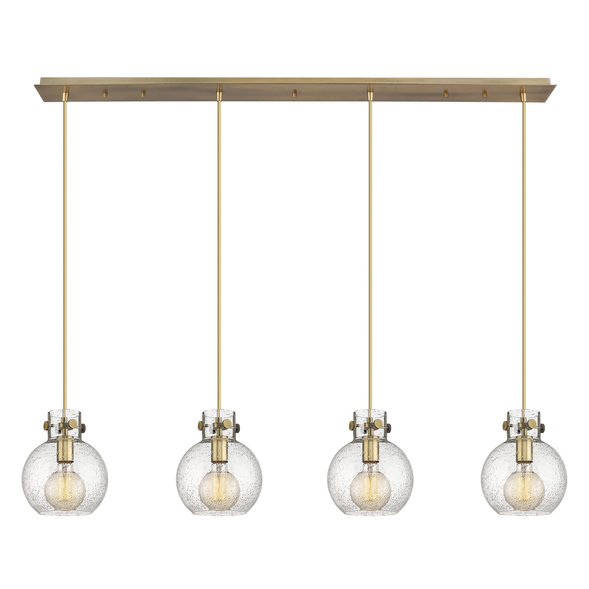 Shown in Brushed Brass finish and Seedy glass and Seedy Glass shade