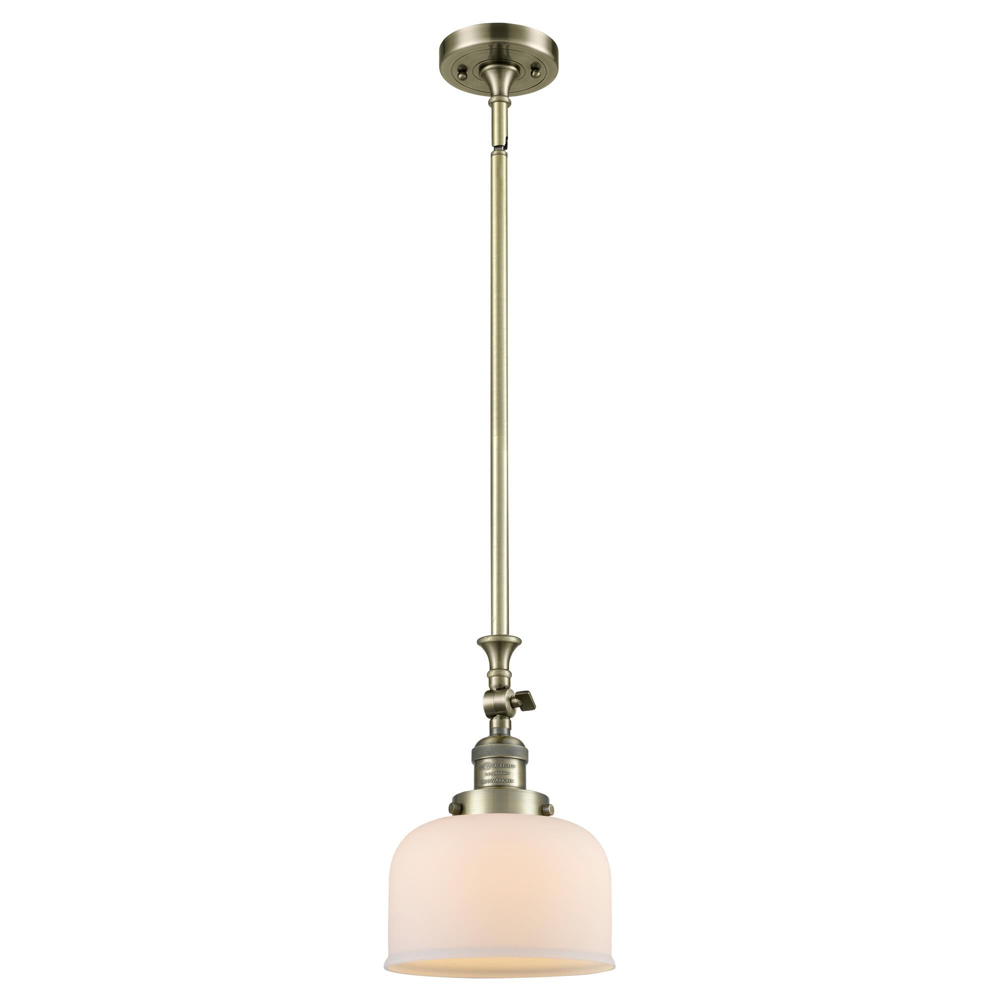 Shown in Antique Brass finish and Matte White Cased glass