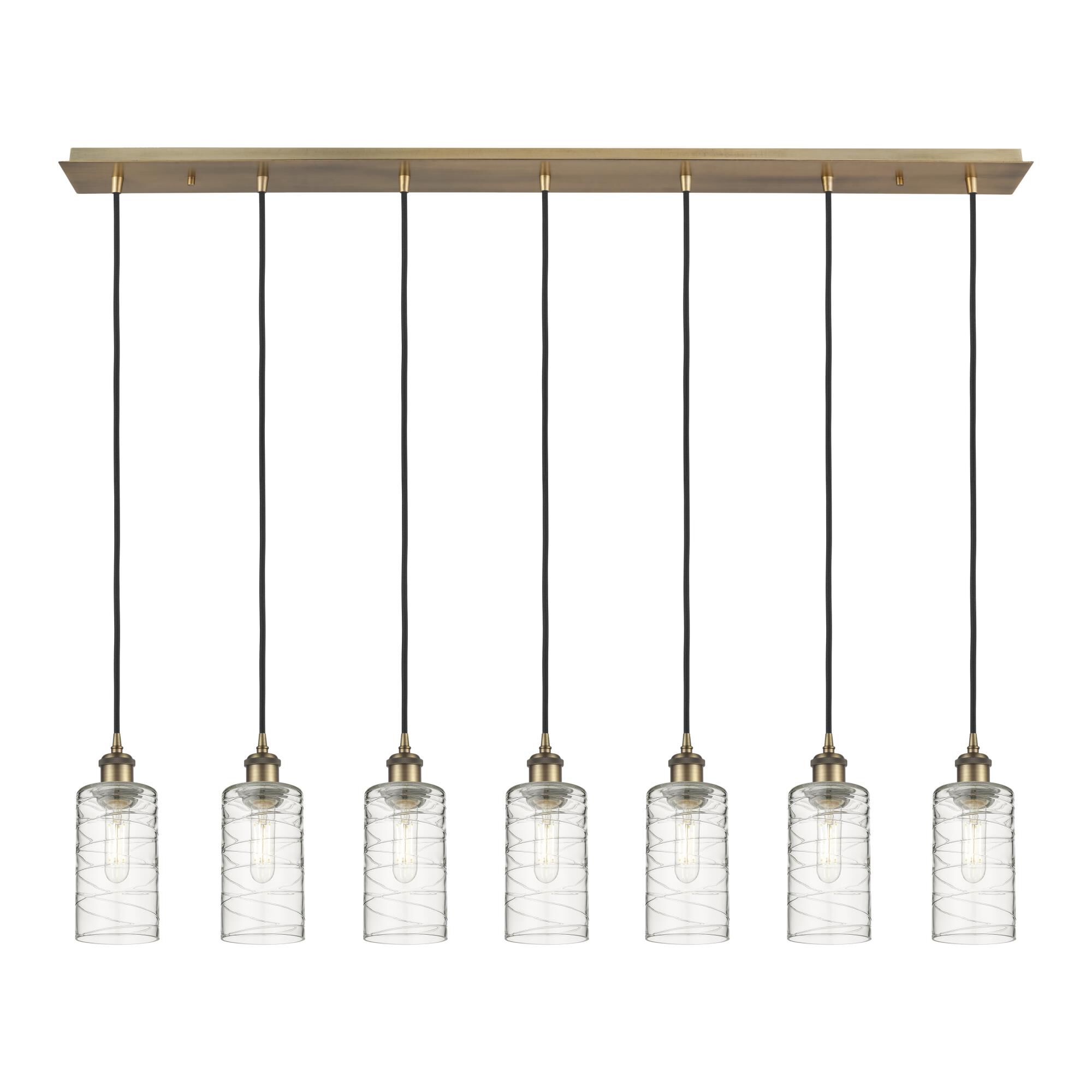 Shown in Brushed Brass finish and Deco Swirl shade