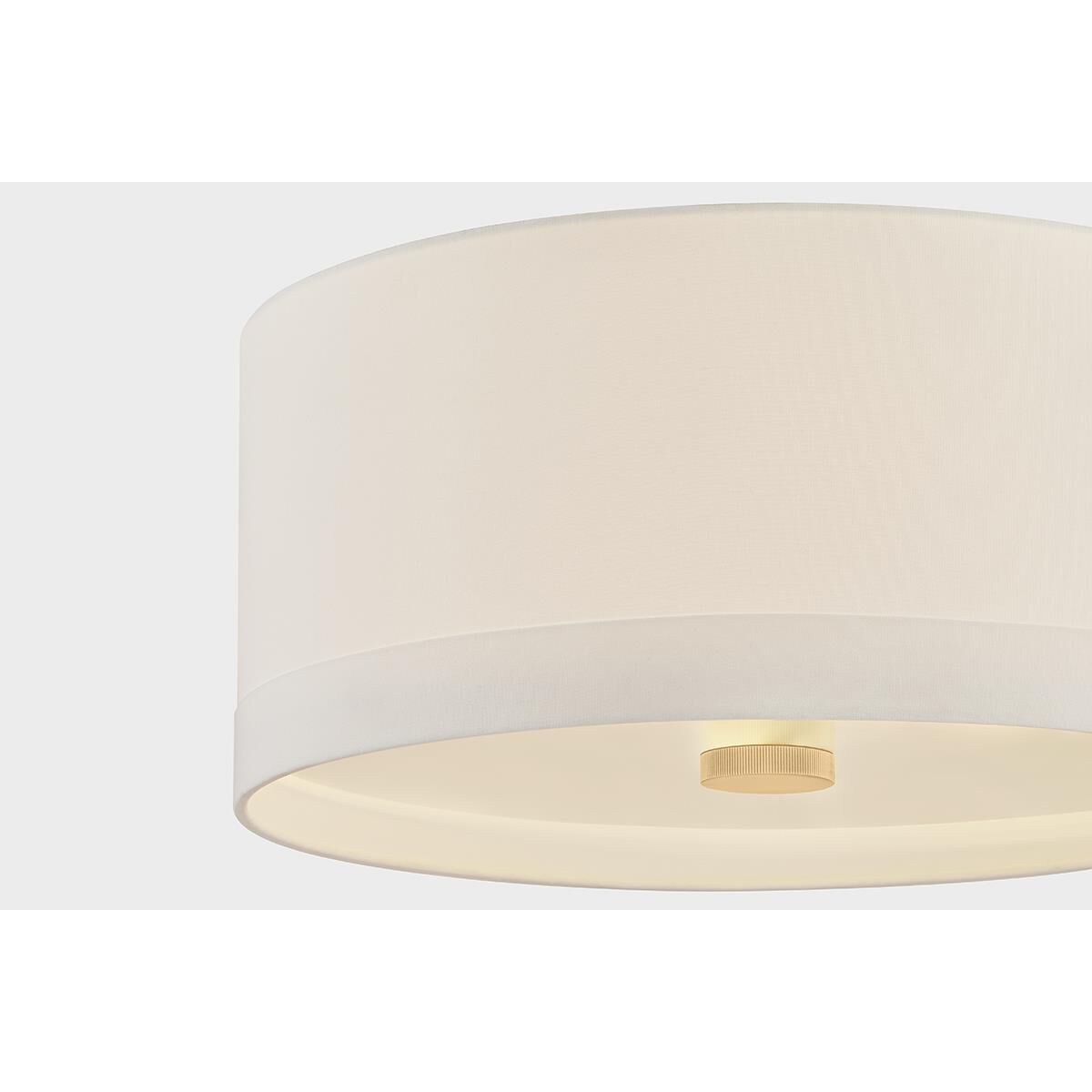 Shown in Aged Brass finish and White Linen shade