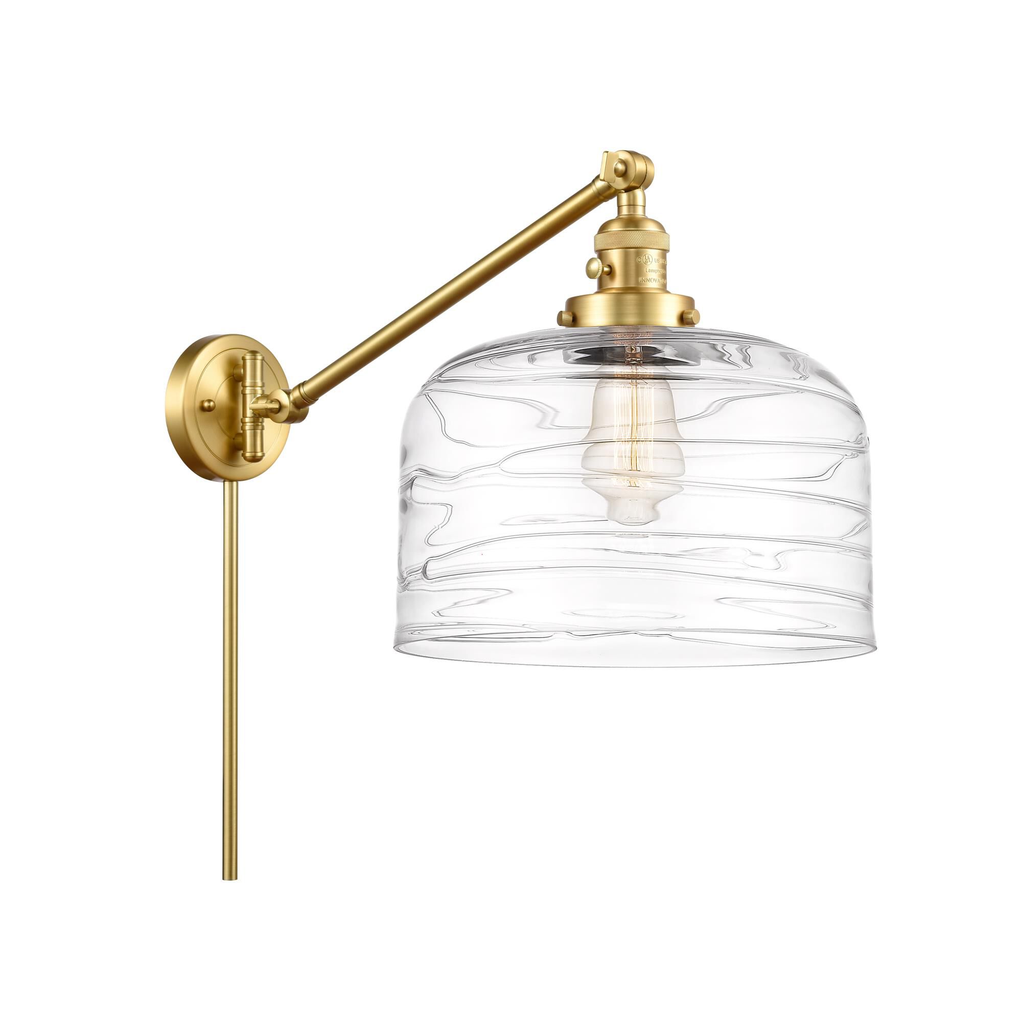 Shown in Satin Gold finish and Clear Deco Swirl X-Large Bell glass