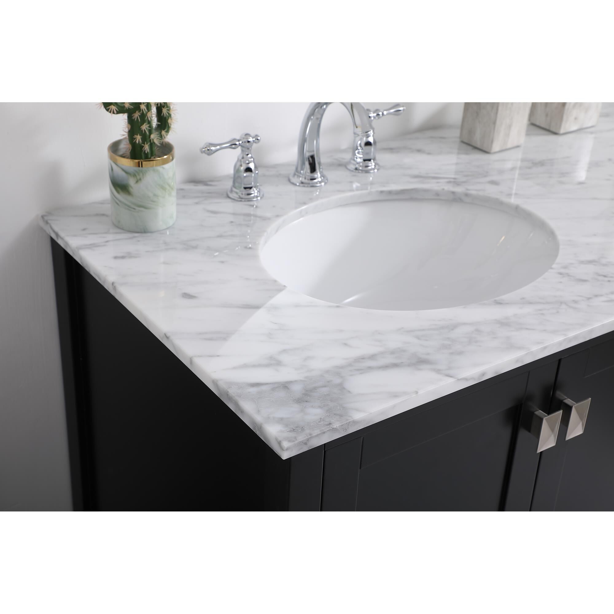 Shown in Black And Brushed Nickel With Carrara White Marble finish