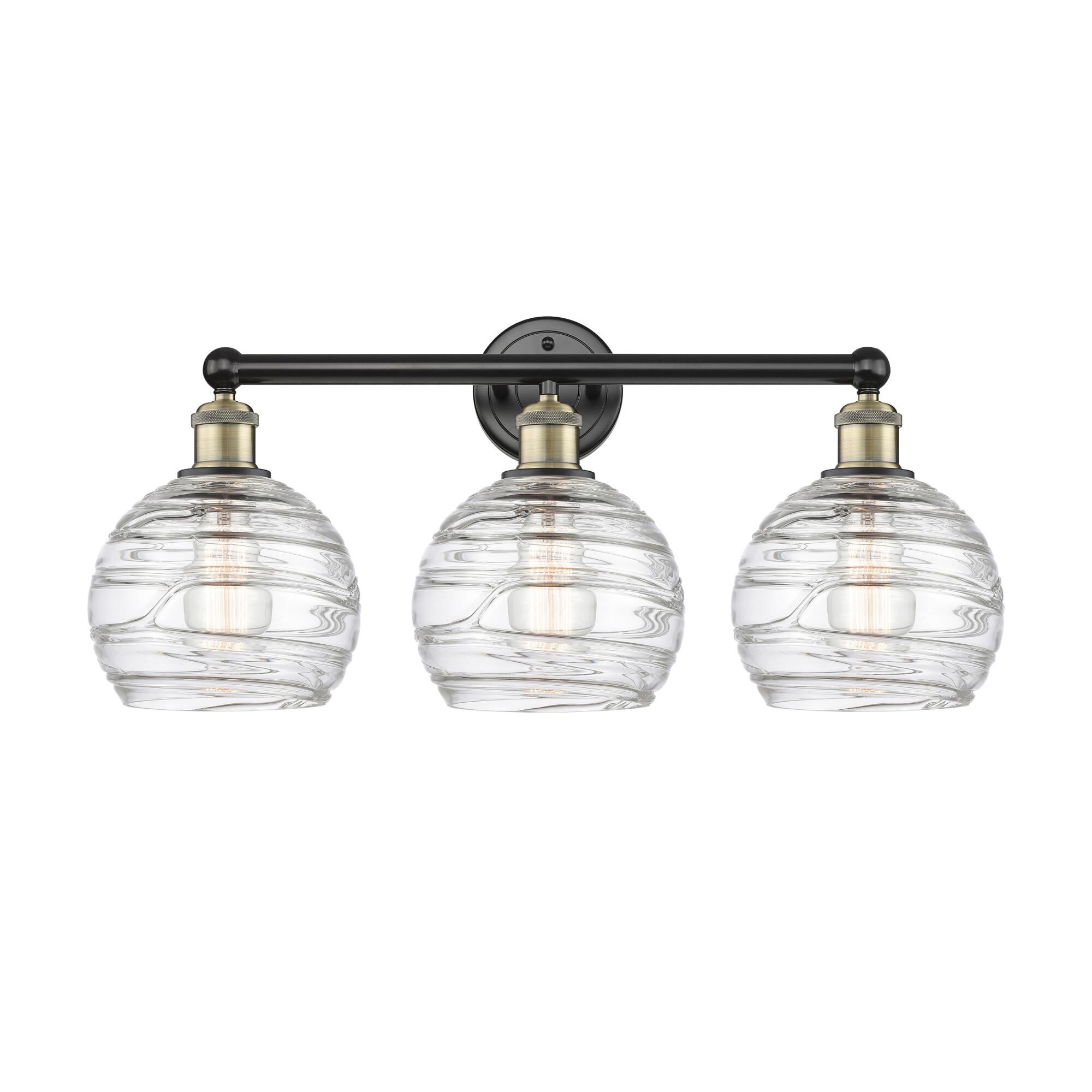 Shown in Black Antique Brass finish and Clear Deco Swirl glass