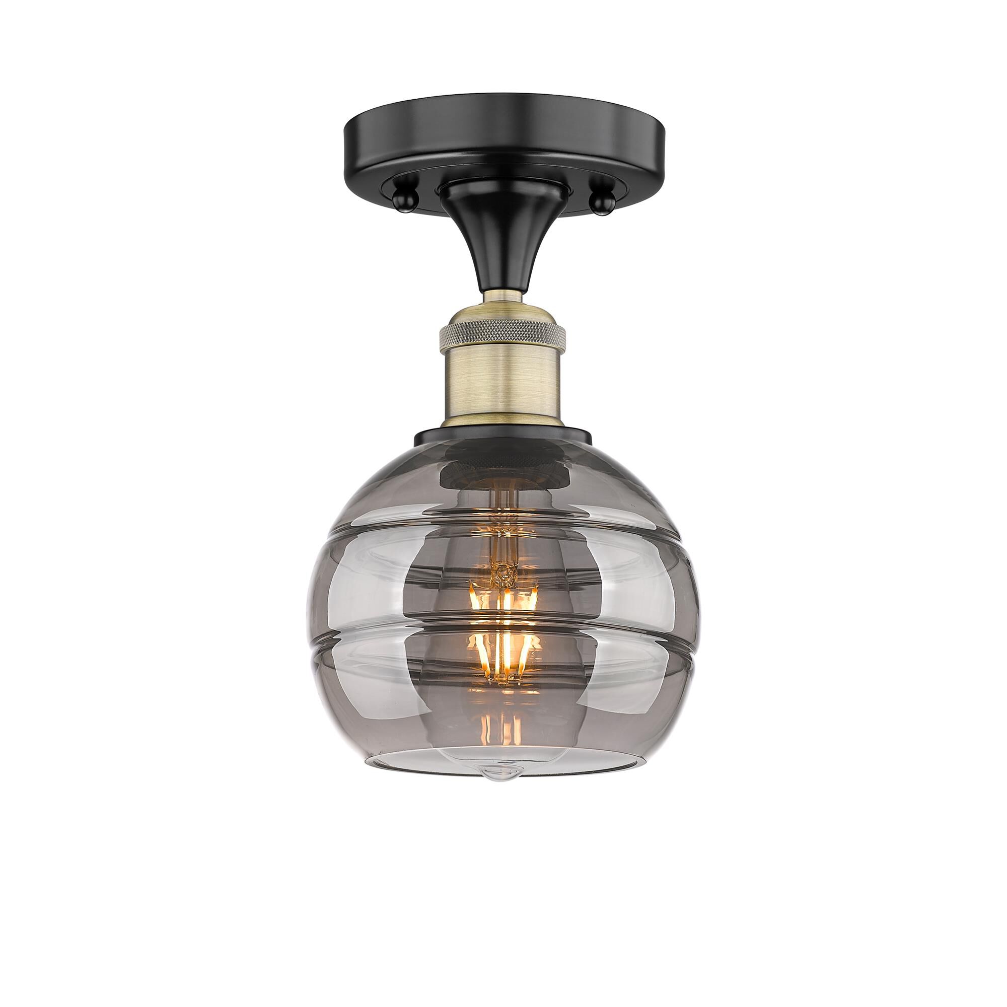 Shown in Black Antique Brass finish and Light Smoke glass