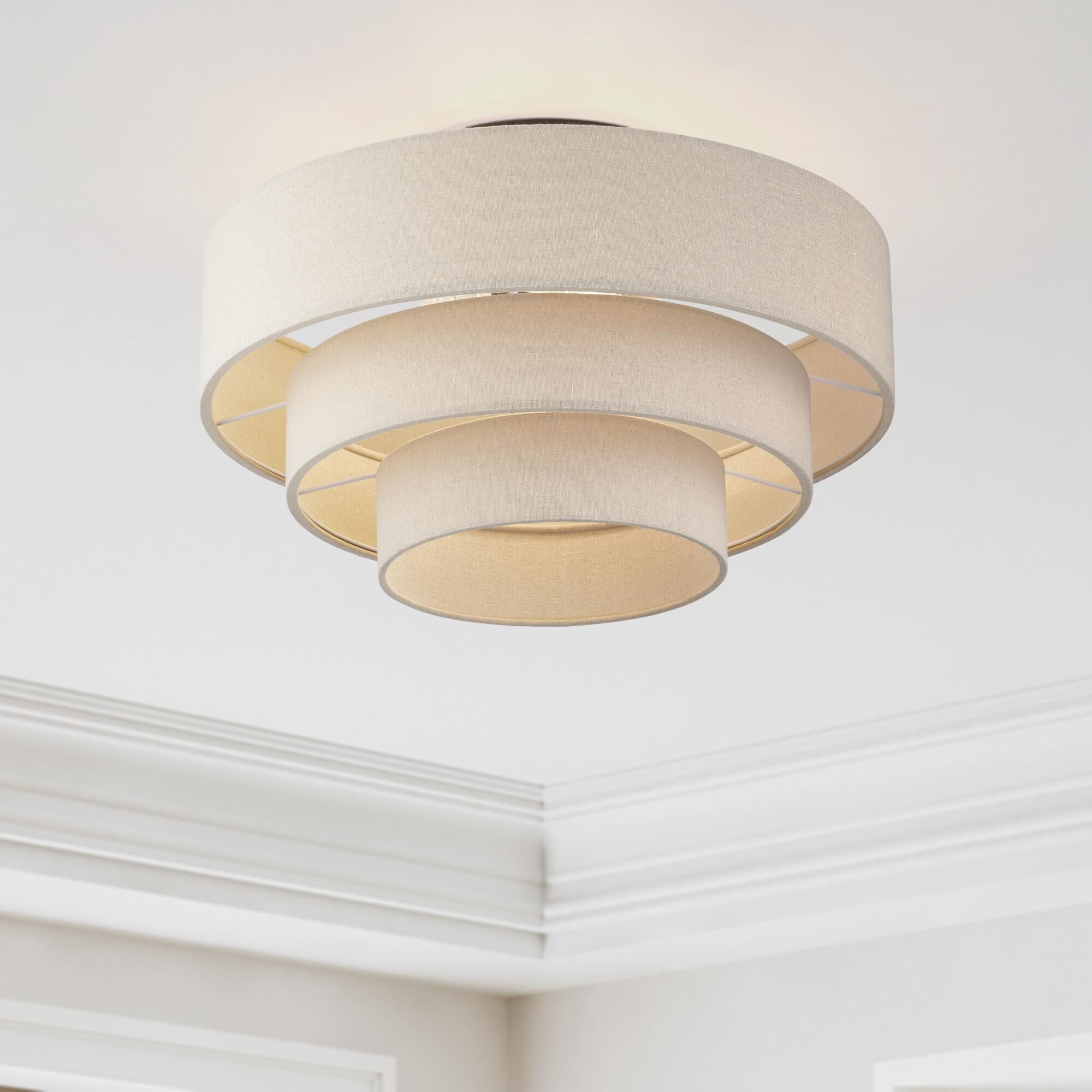 Shown in Bronze finish and Hand Crafted Parchment Color Hardback Fabric shade