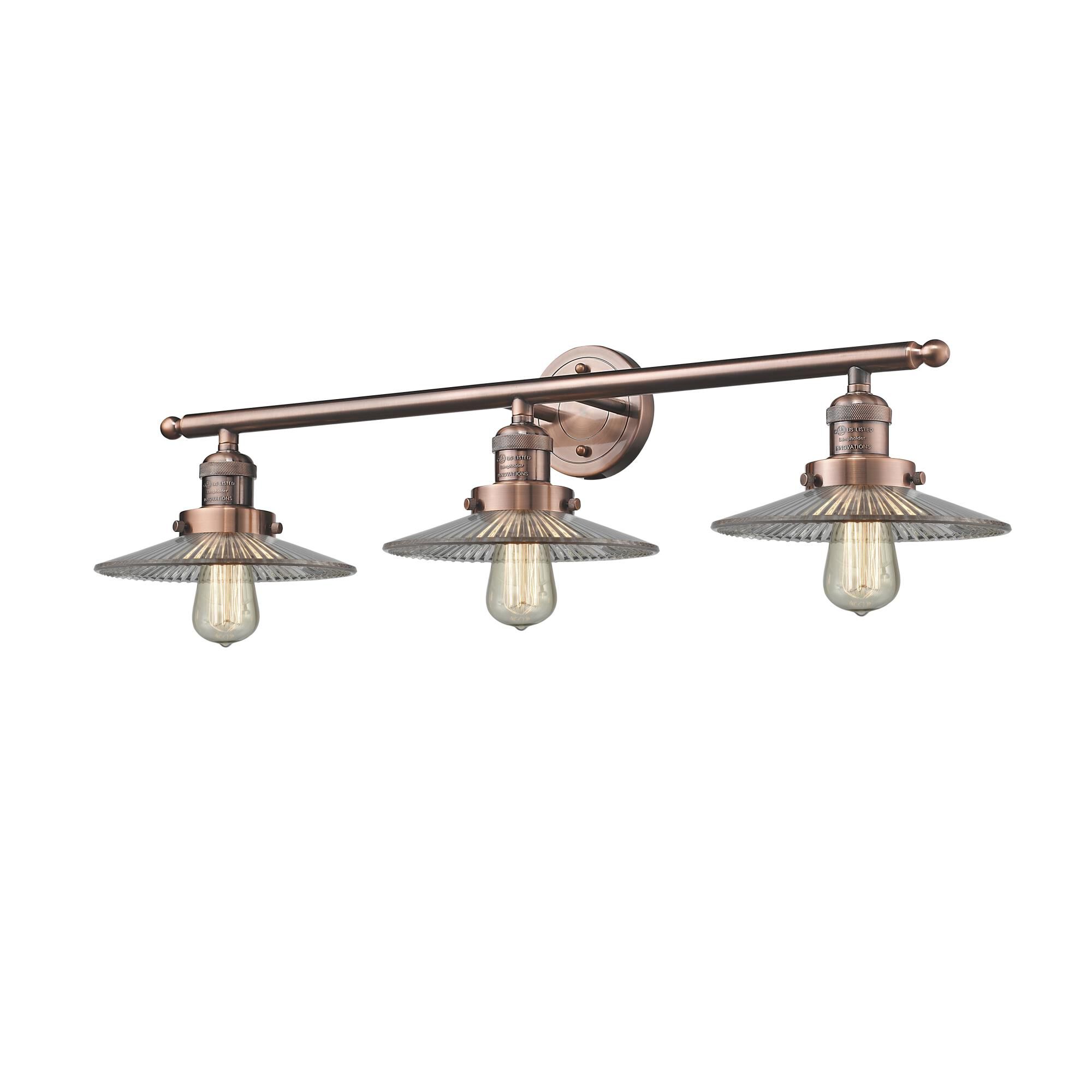 Shown in Antique Copper finish and Clear Halophane glass