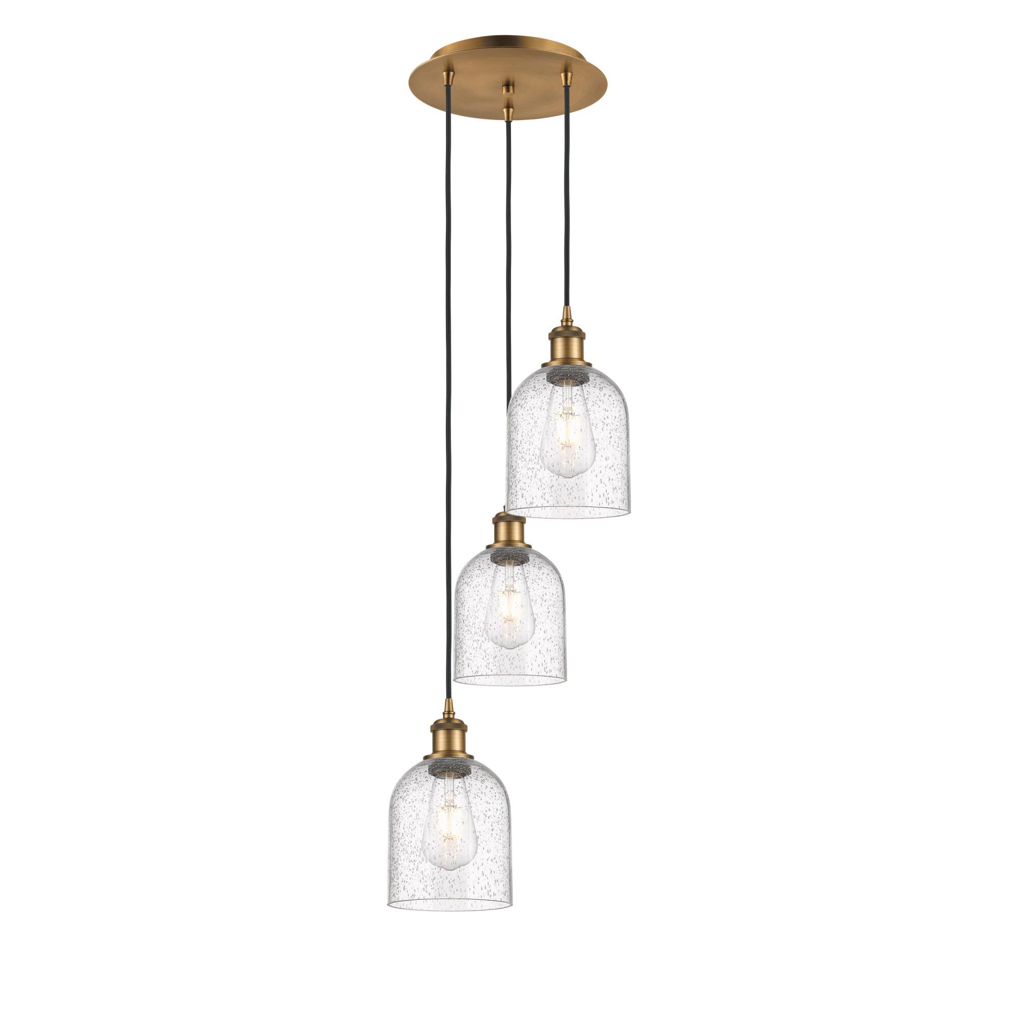 Shown in Brushed Brass finish and Seedy glass