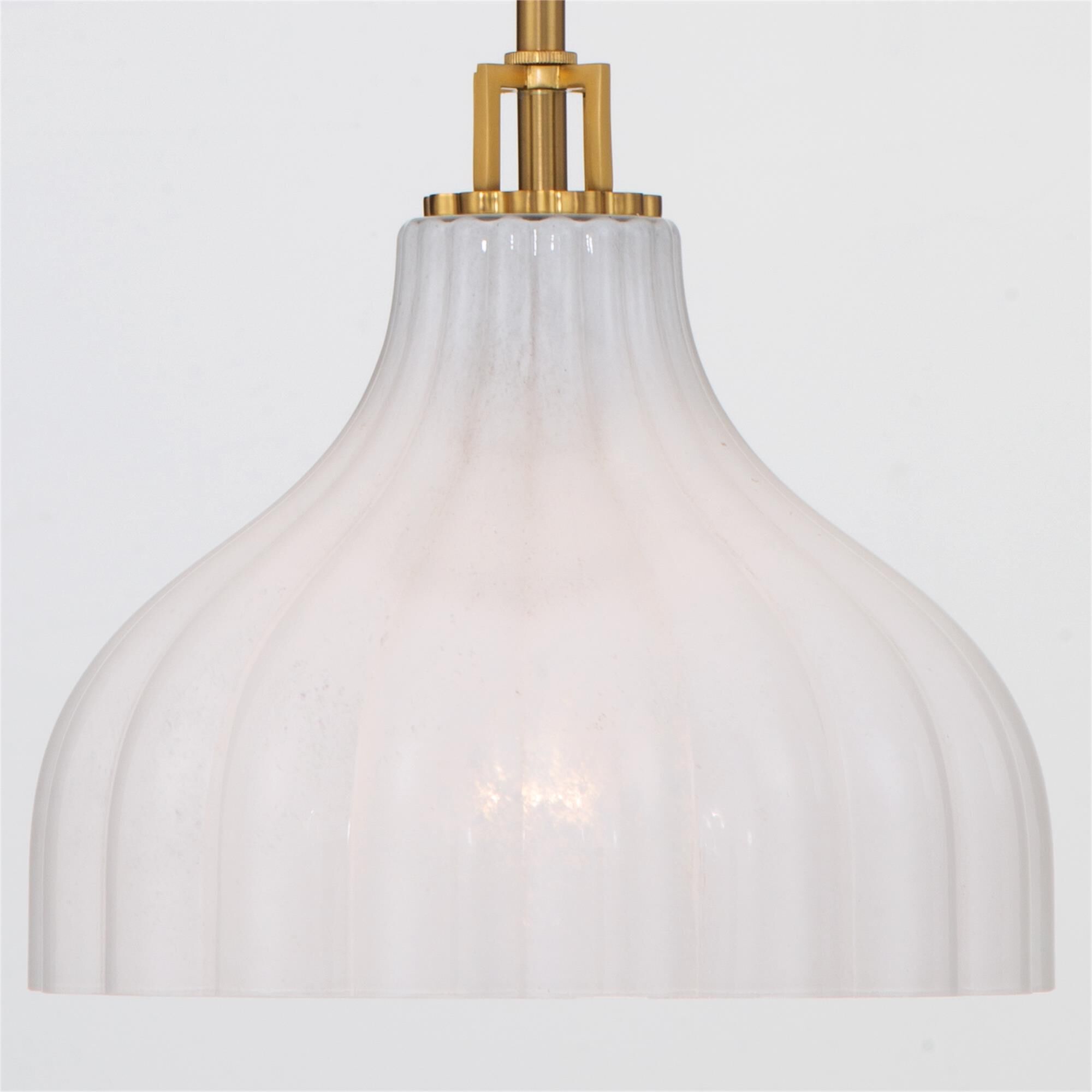 Shown in Luxe Gold finish and Strie glass and Strie Glass shade