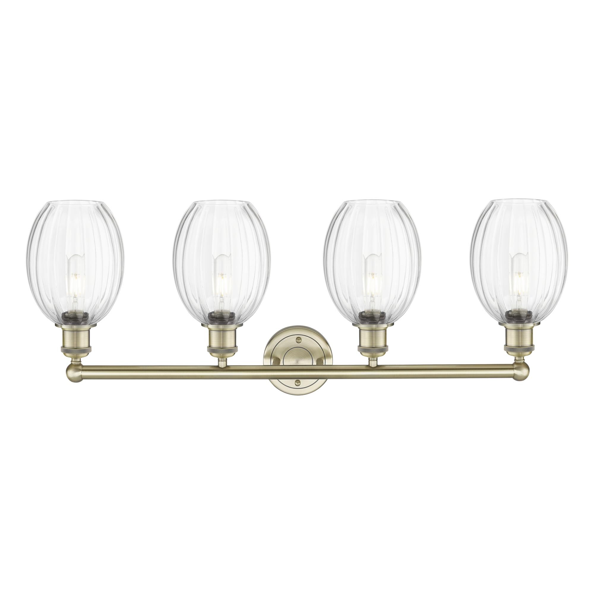 Shown in Antique Brass finish and Clear glass