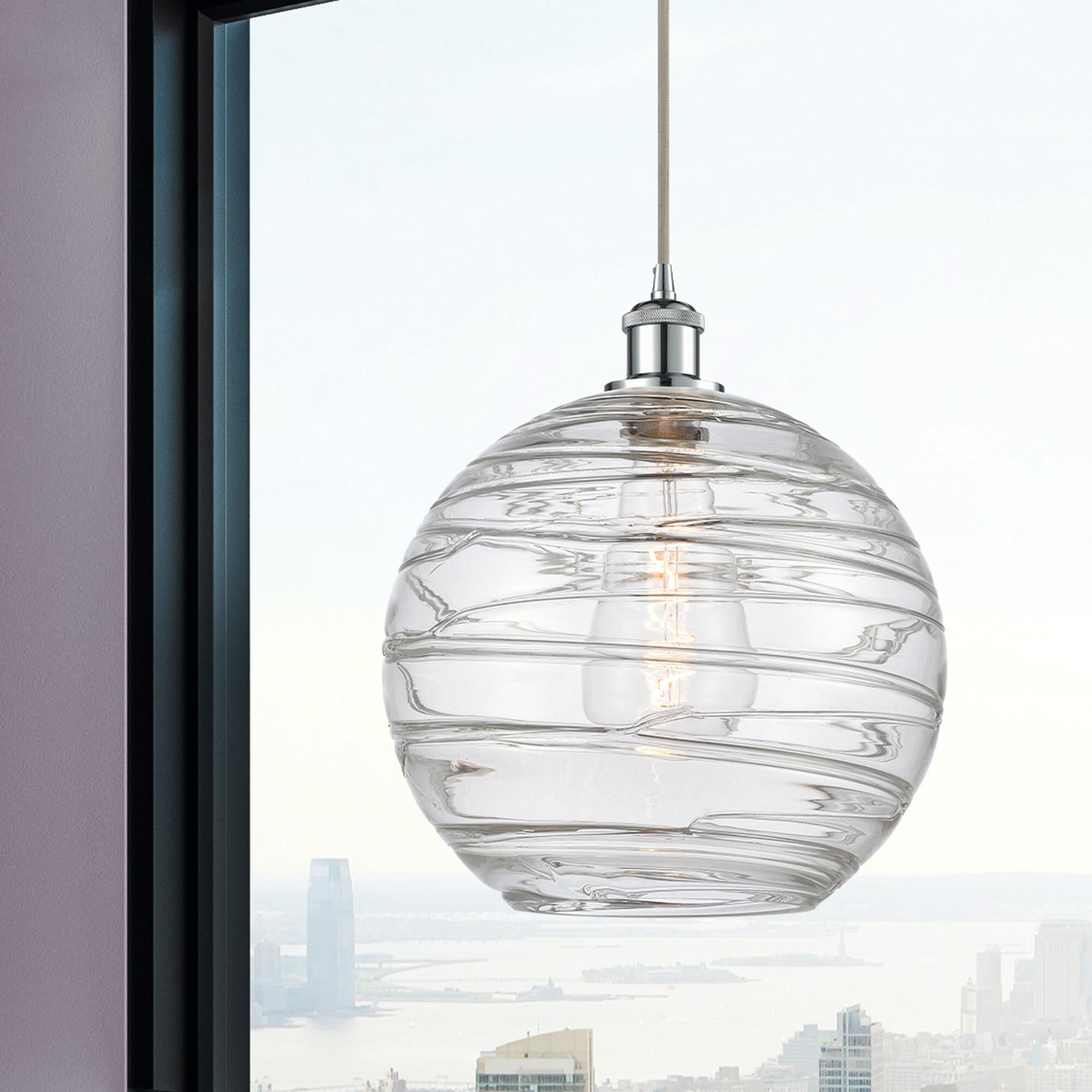 Shown in Polished Chrome finish and Transparent Deco Swirl glass