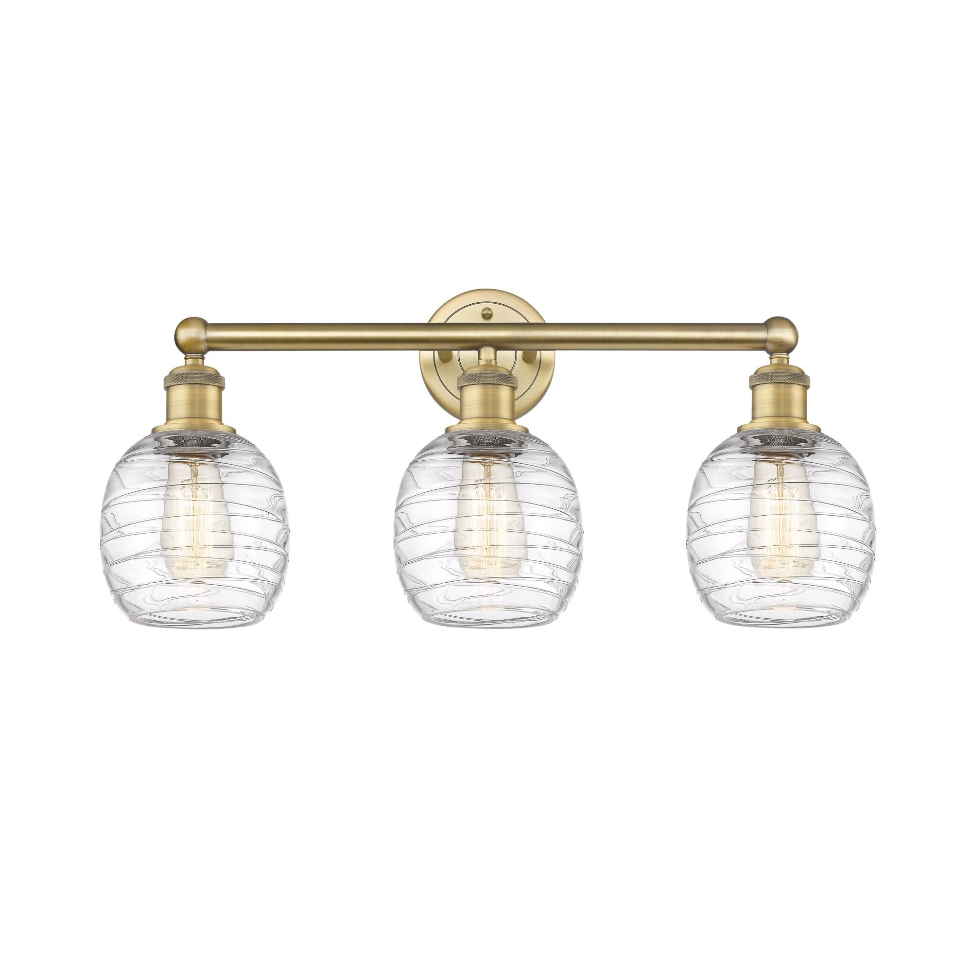 Shown in Brushed Brass finish and Deco Swirl glass
