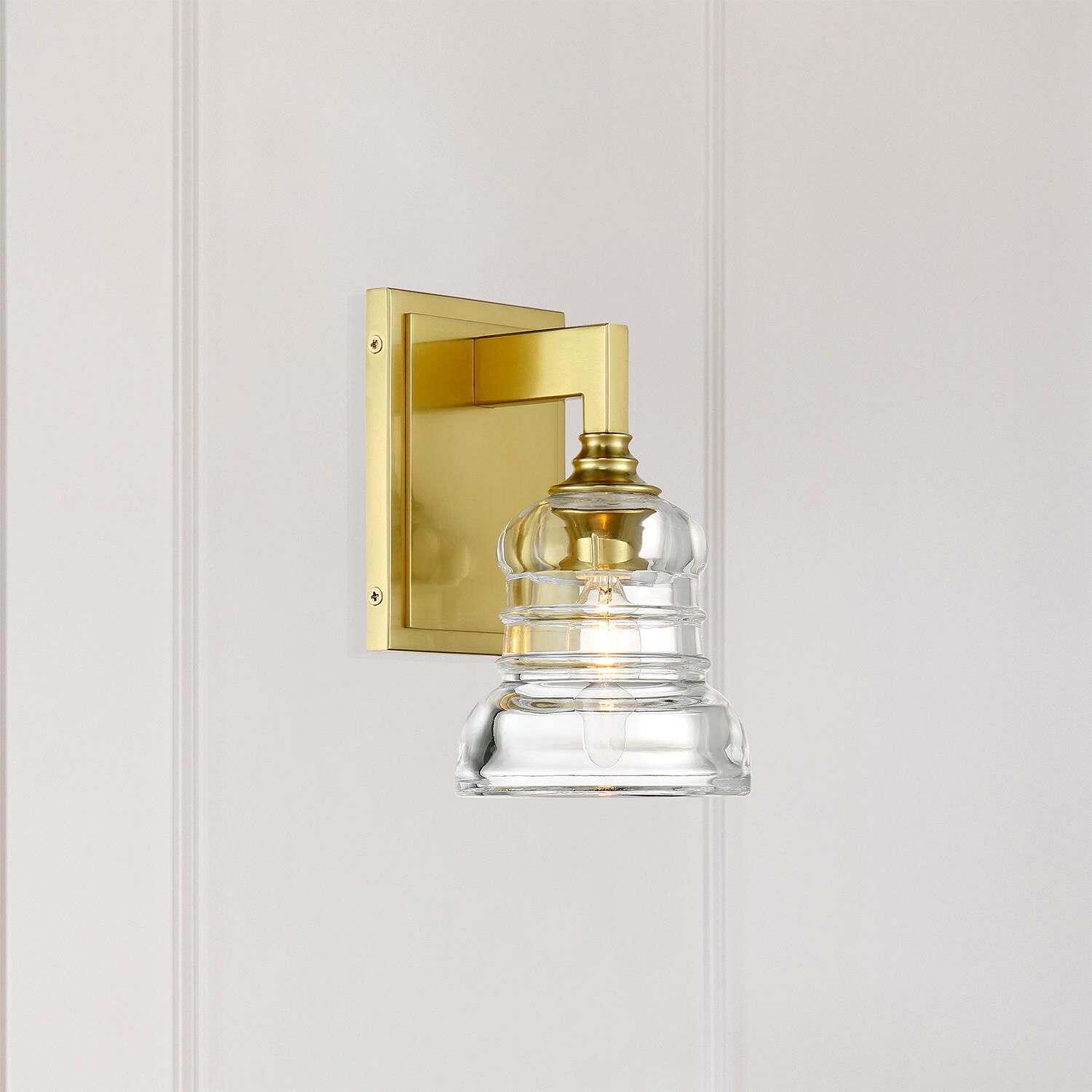 Shown in Aged Brass finish and Clear glass