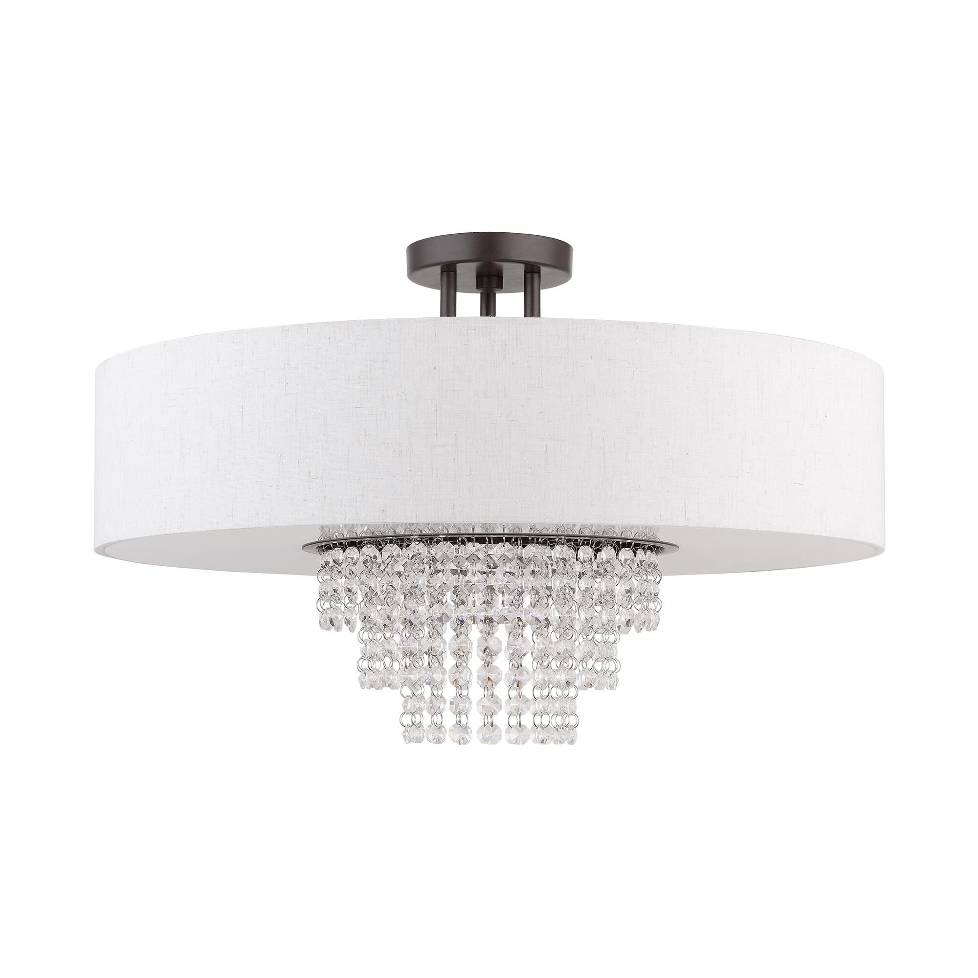 Shown in English Bronze finish and Hand Crafted Oatmeal Color Fabric Outside & White Fabric Inside Hardback  with Clear Crystals shade