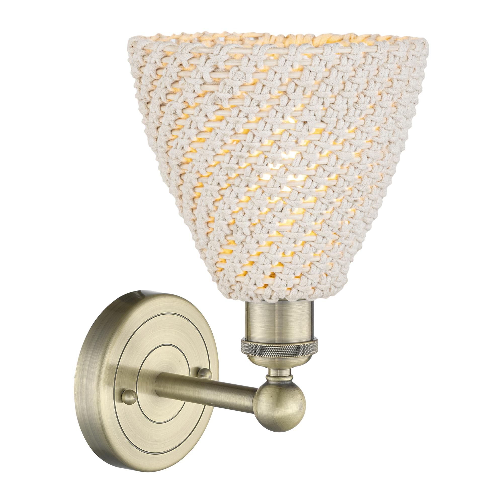 Shown in Antique Brass finish and Natural shade