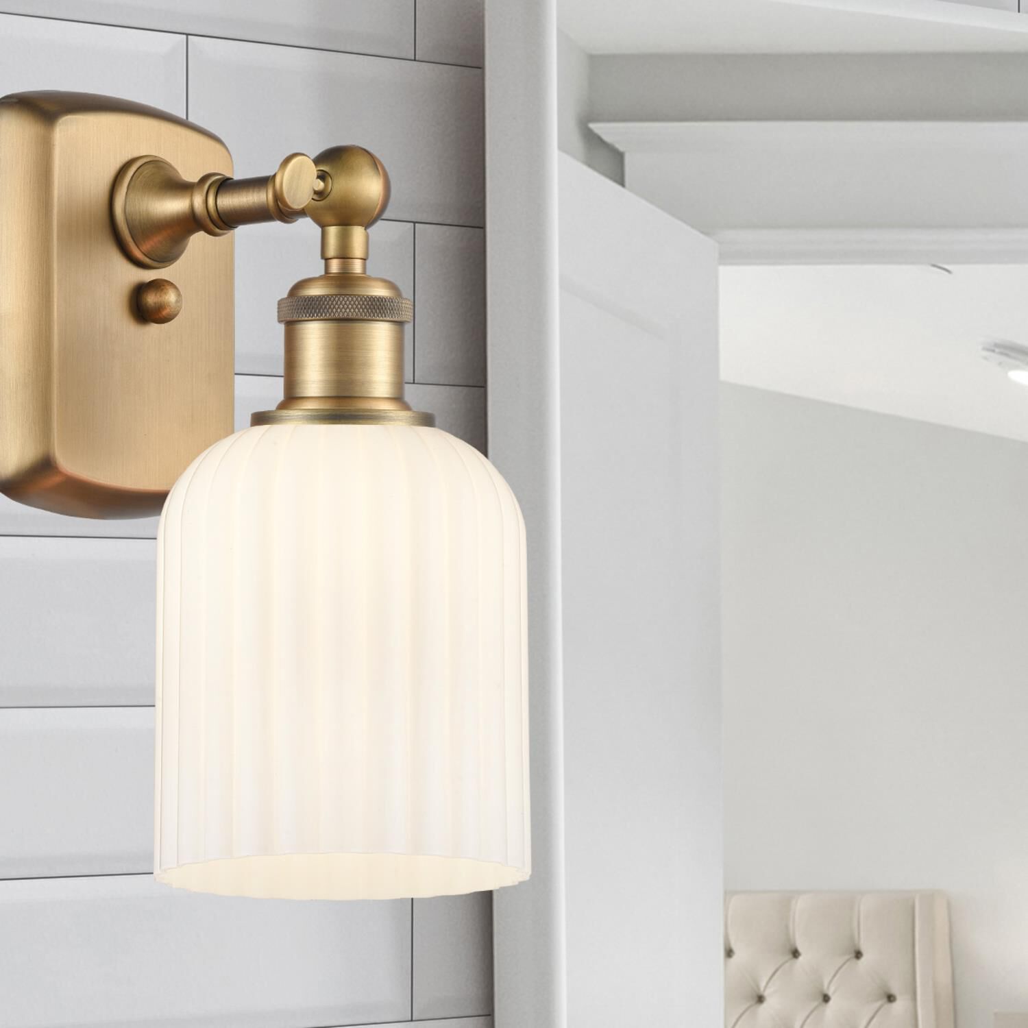 Shown in Brushed Brass finish and Gloss White glass