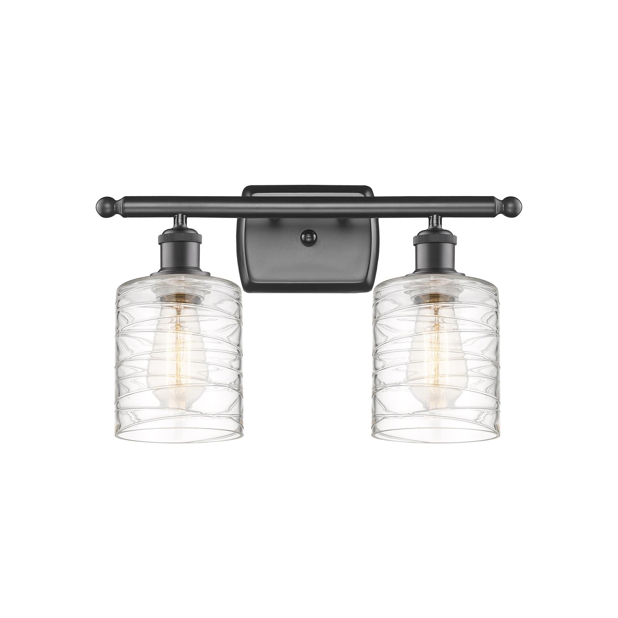 Shown in Oil Rubbed Bronze finish and Deco Swirl Cobbleskill glass