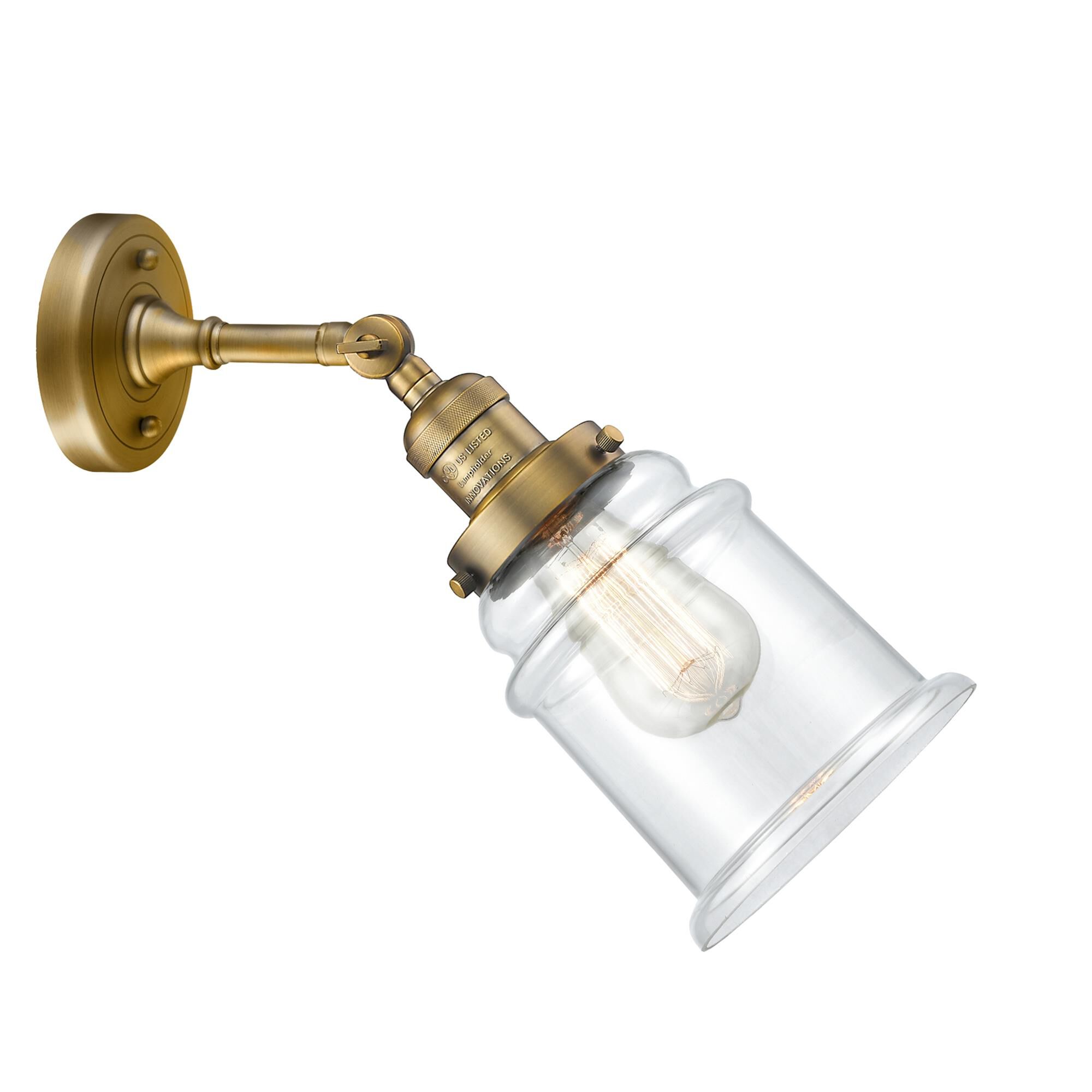 Shown in Brushed Brass finish and Clear glass and None accent