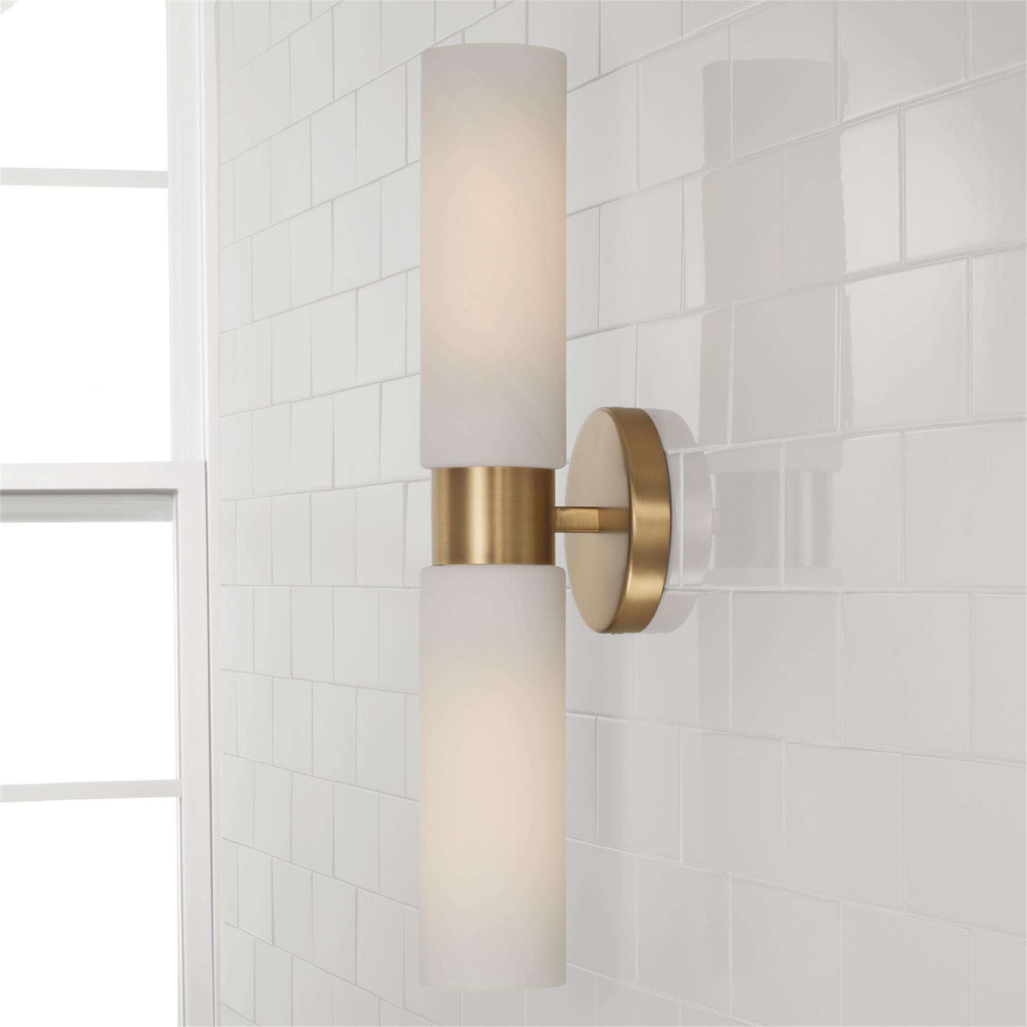 Shown in Aged Brass finish and Faux Alabaster glass
