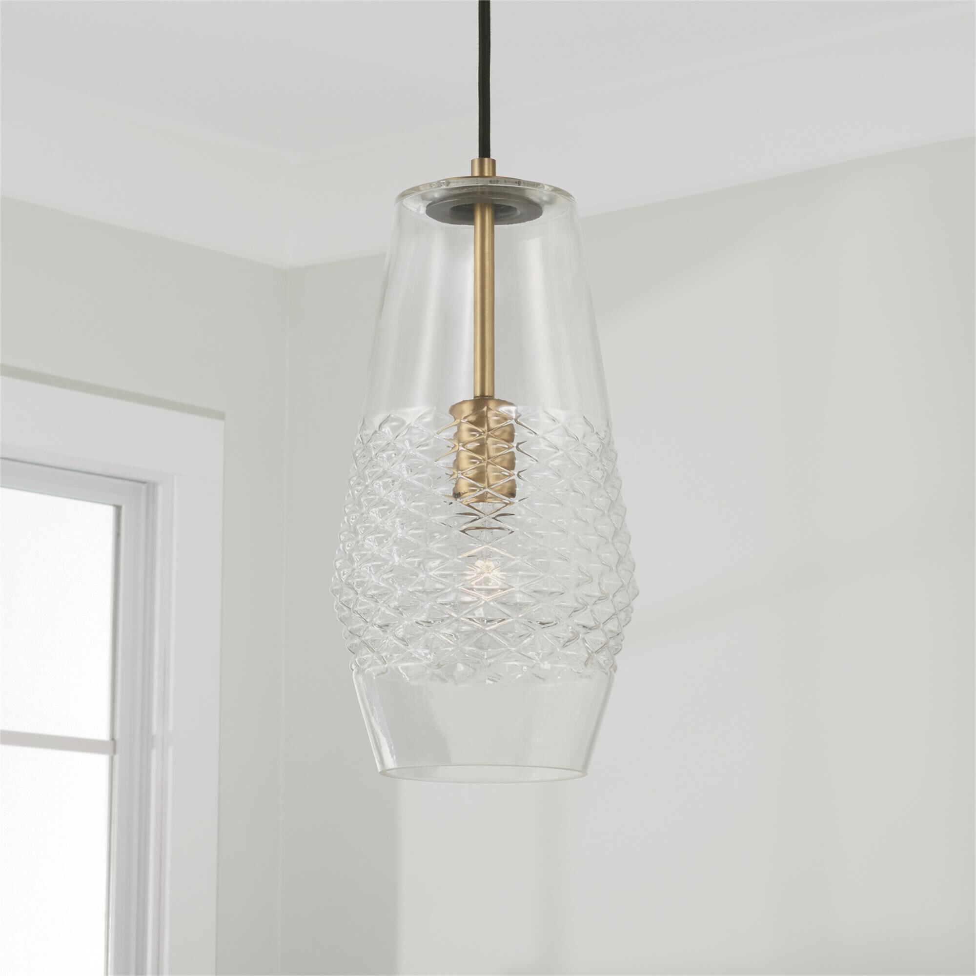 Shown in Aged Brass finish and Diamond Embossed glass