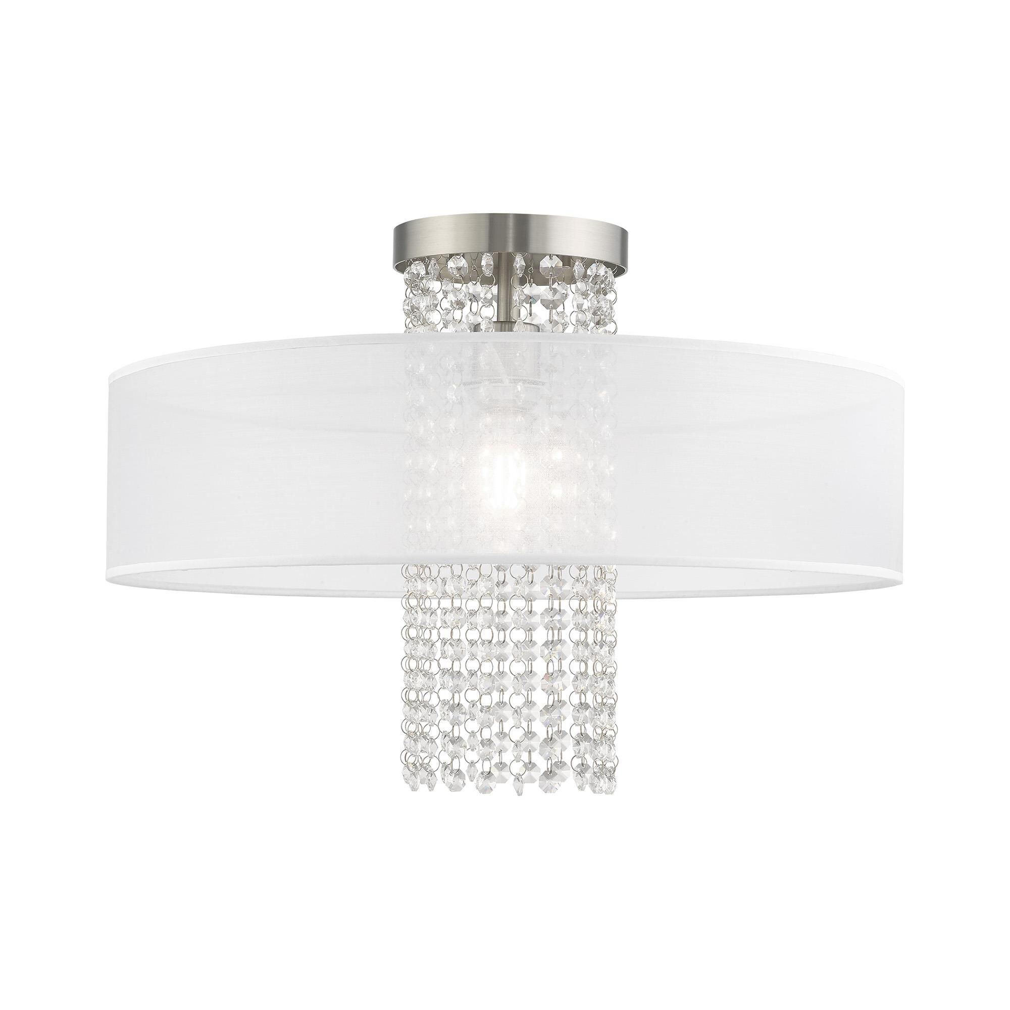 Shown in Brushed Nickel finish and Clear Crystals with Hand Crafted Translucent Fabric shade