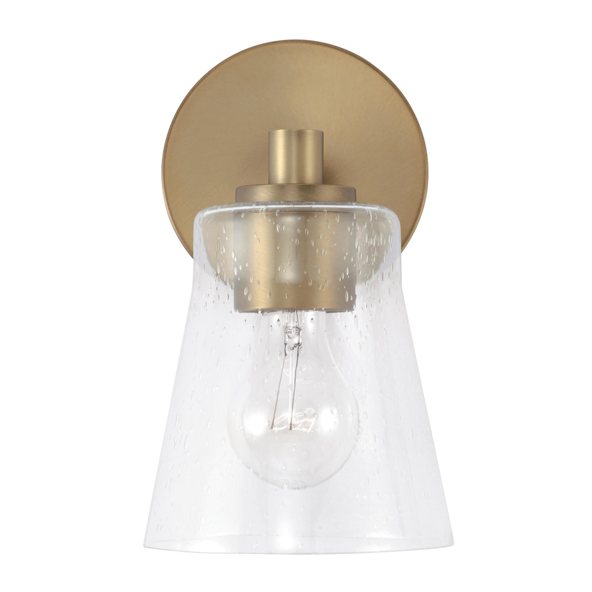 Shown in Aged Brass finish and Clear Seeded glass