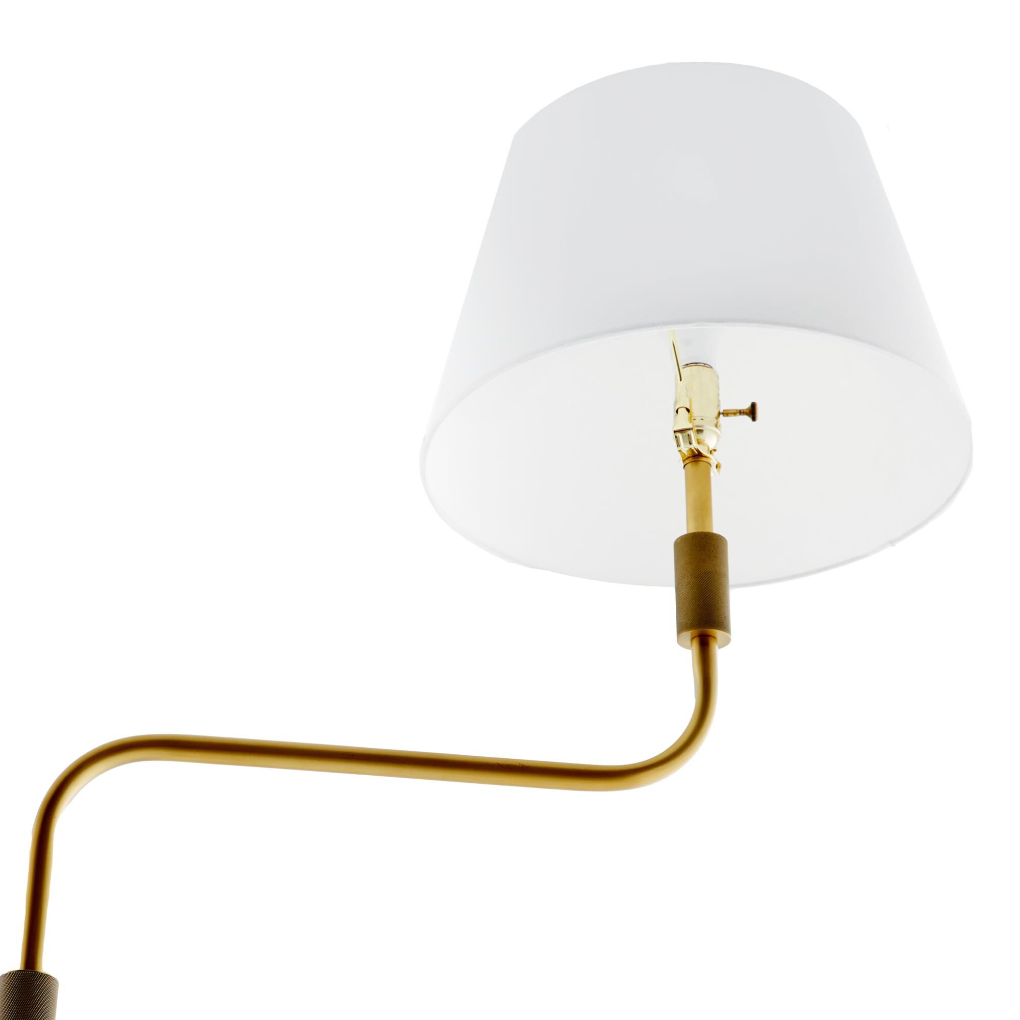 Shown in Antique Brass finish and Linen shade