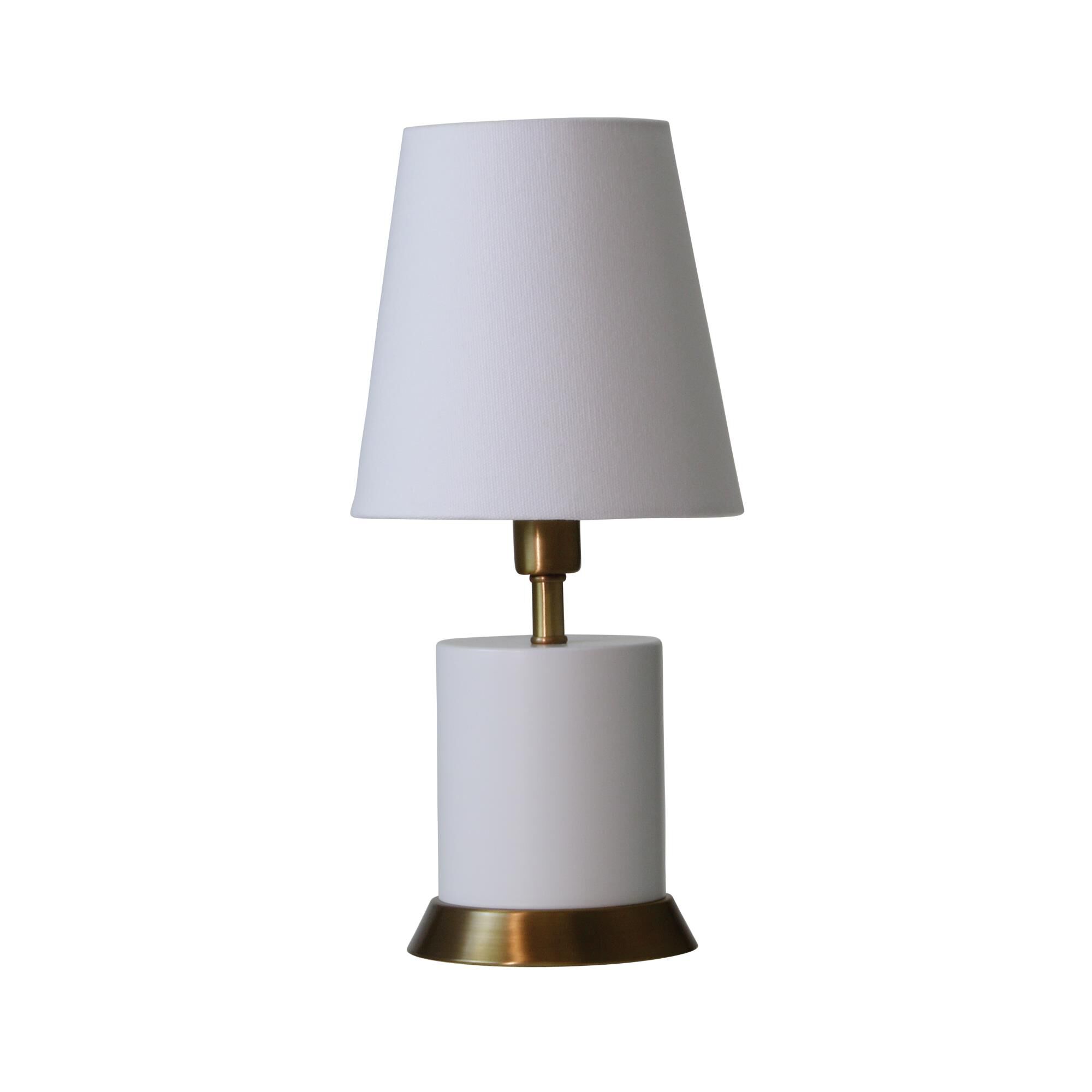 Shown in White With Weathered Brass Accents finish and Linen Hardback shade and Weathered Brass accent